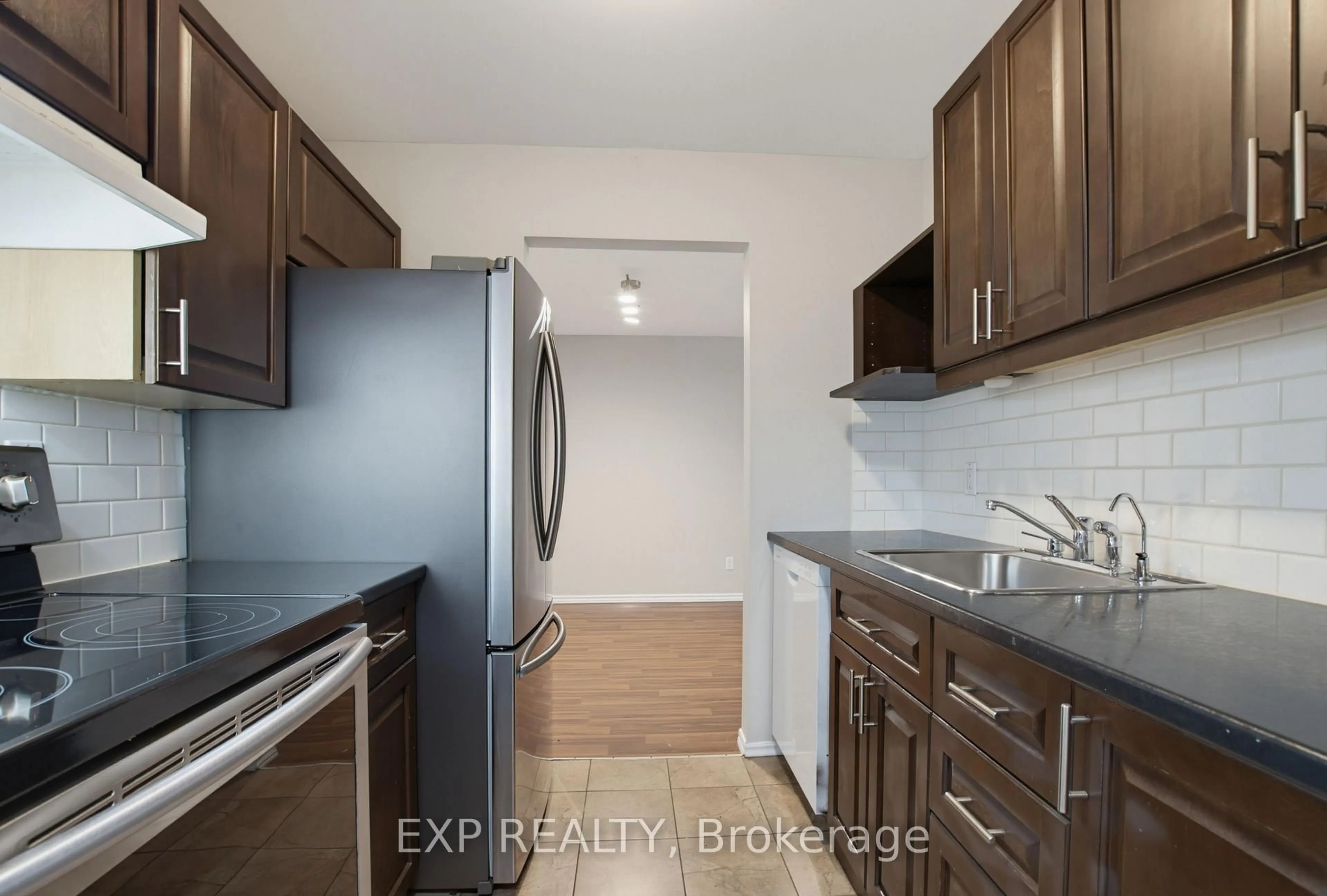 Standard kitchen, wood/laminate floor for 144 Conway Dr #106, London South Ontario N6E 3N3