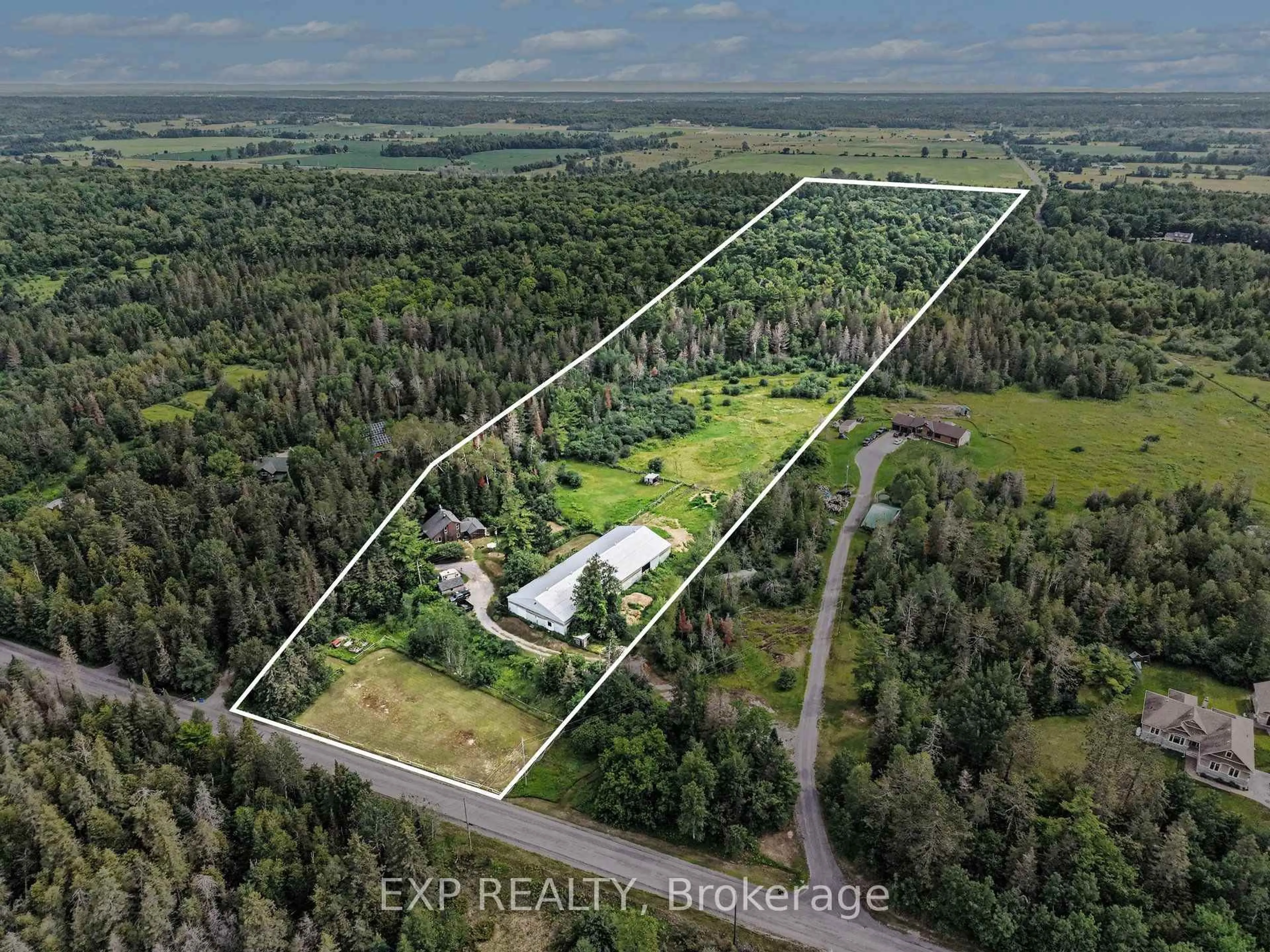A pic from outside/outdoor area/front of a property/back of a property/a pic from drone, forest/trees view for 1798 Burnt Lands Rd, Carp Ontario K0A 1L0