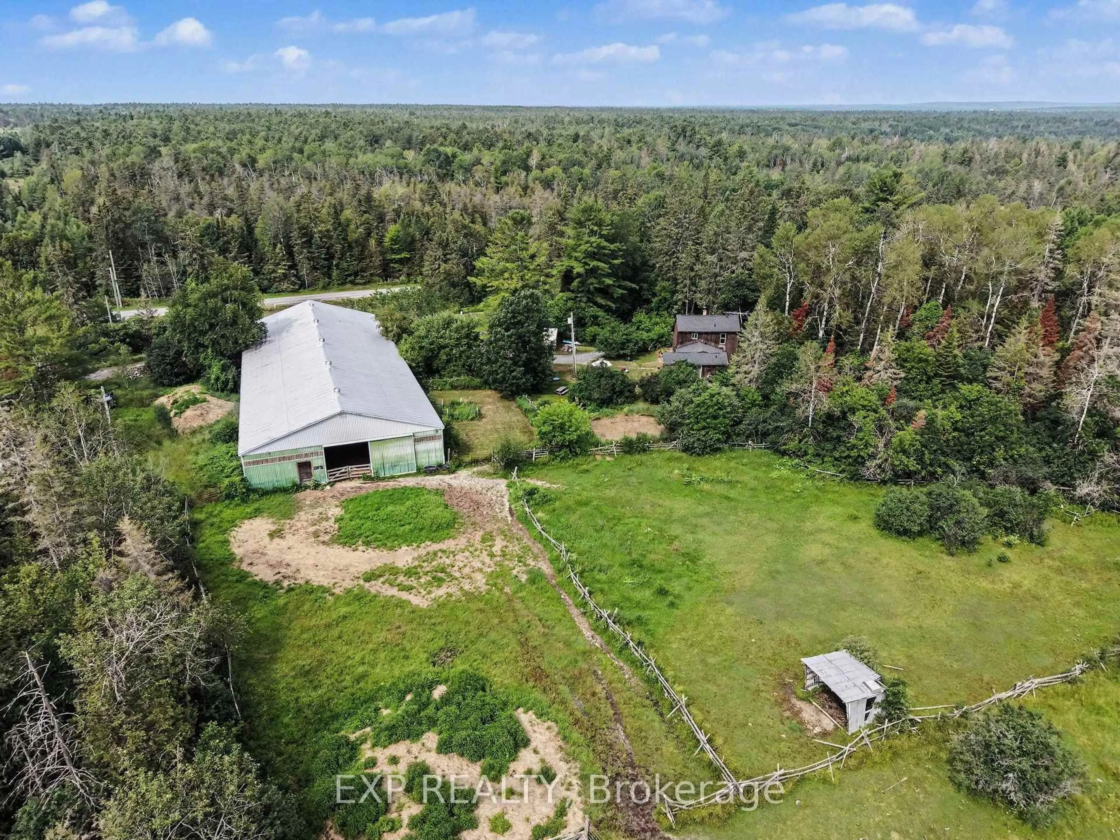 A pic from outside/outdoor area/front of a property/back of a property/a pic from drone, forest/trees view for 1798 Burnt Lands Rd, Carp Ontario K0A 1L0