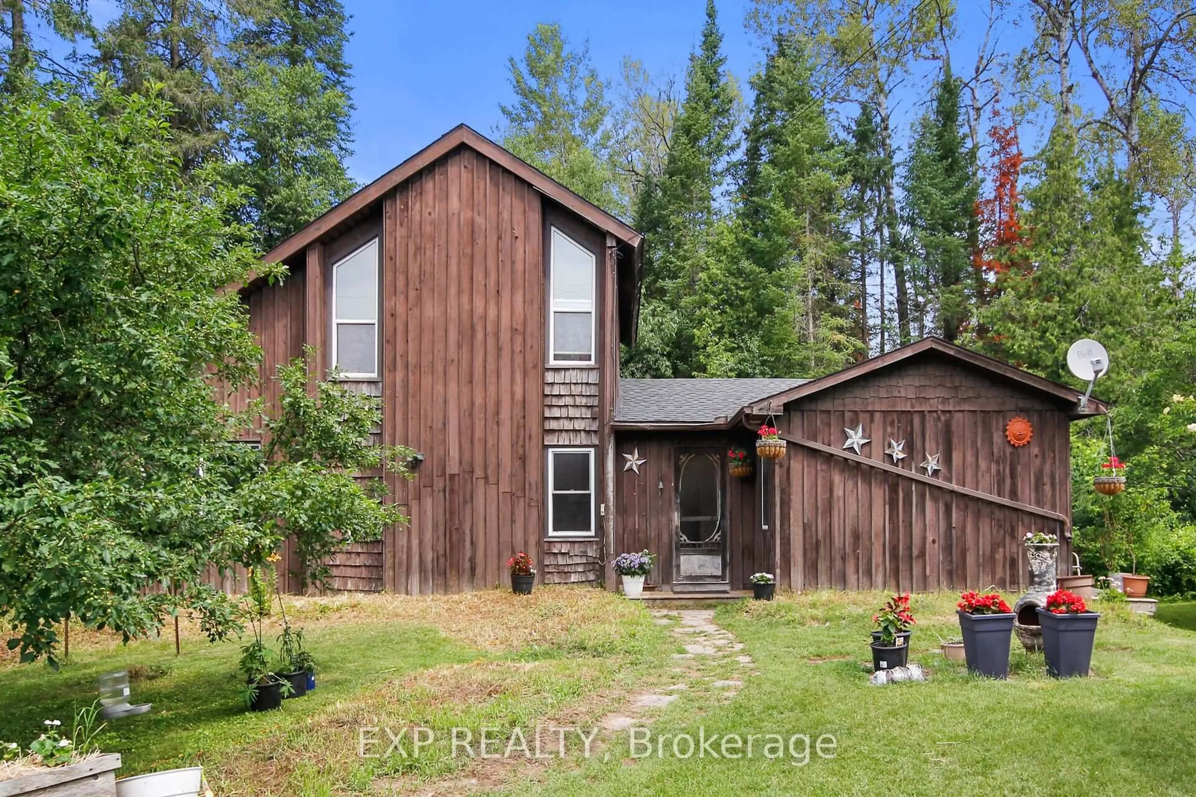 A pic from outside/outdoor area/front of a property/back of a property/a pic from drone, forest/trees view for 1798 Burnt Lands Rd, Carp Ontario K0A 1L0