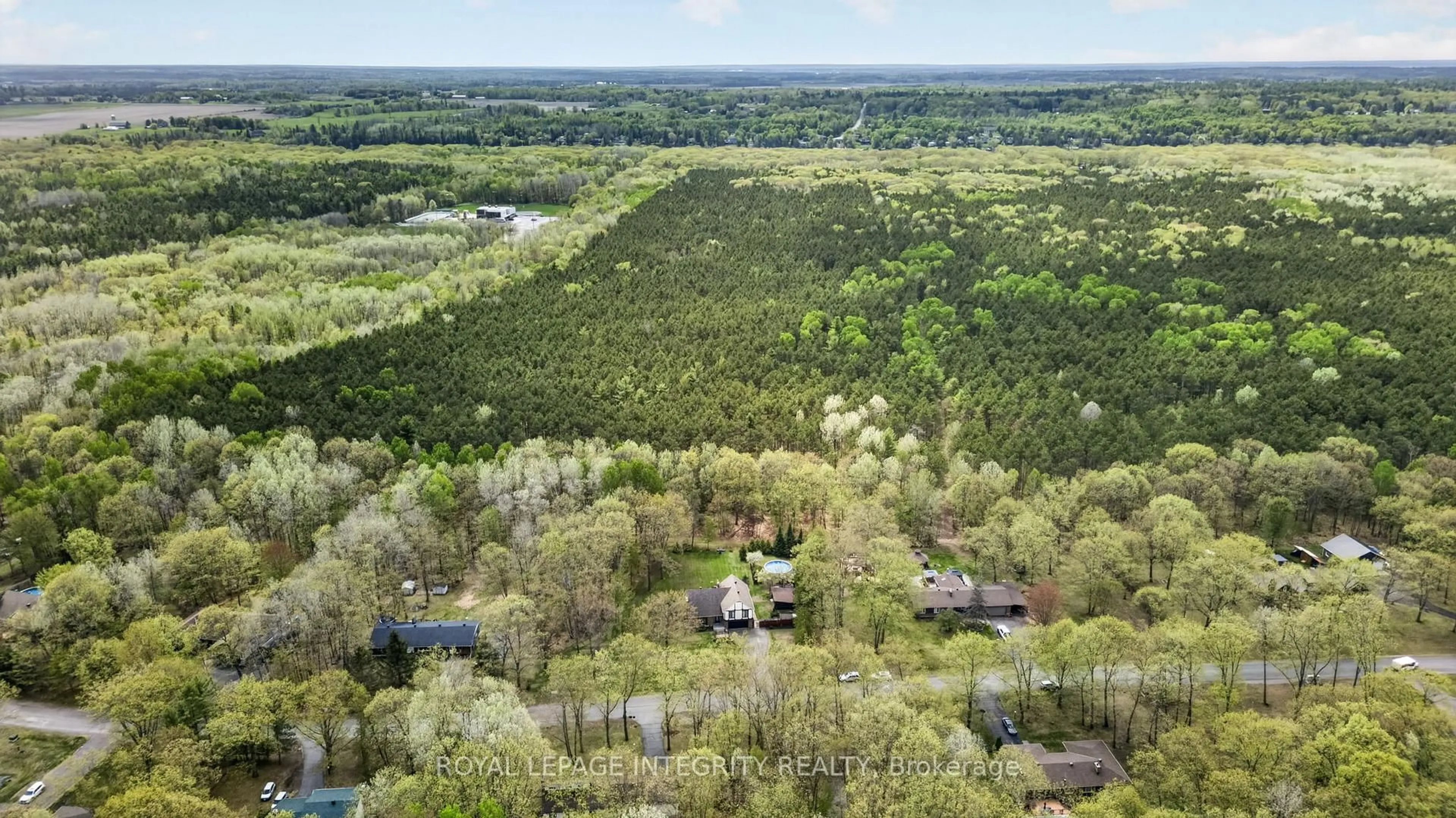 A pic from outside/outdoor area/front of a property/back of a property/a pic from drone, forest/trees view for 285 Fireside Dr, Ottawa Ontario K0A 3M0