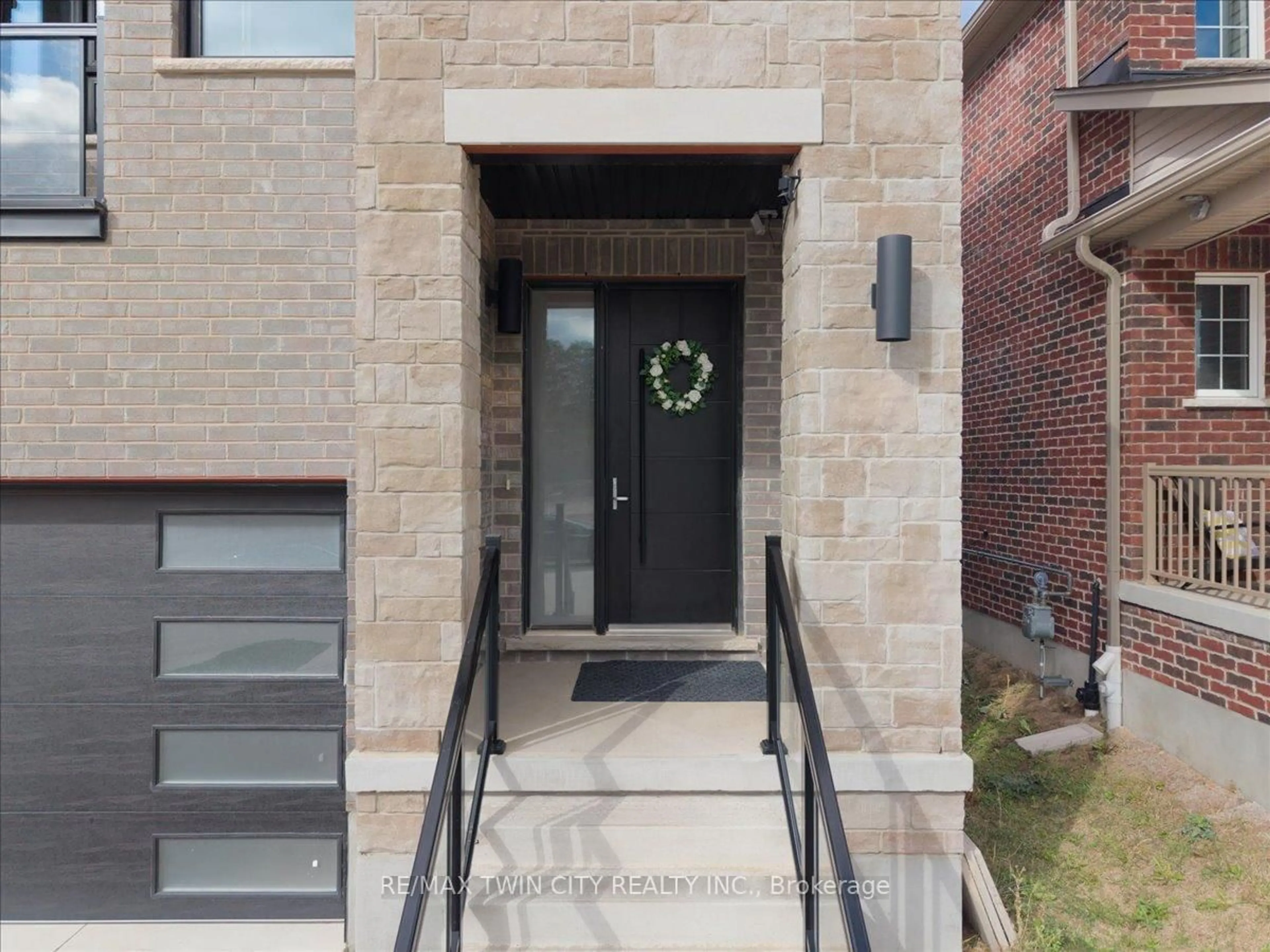 Home with brick exterior material, street for 657 Benninger Dr, Kitchener Ontario N2E 0J2