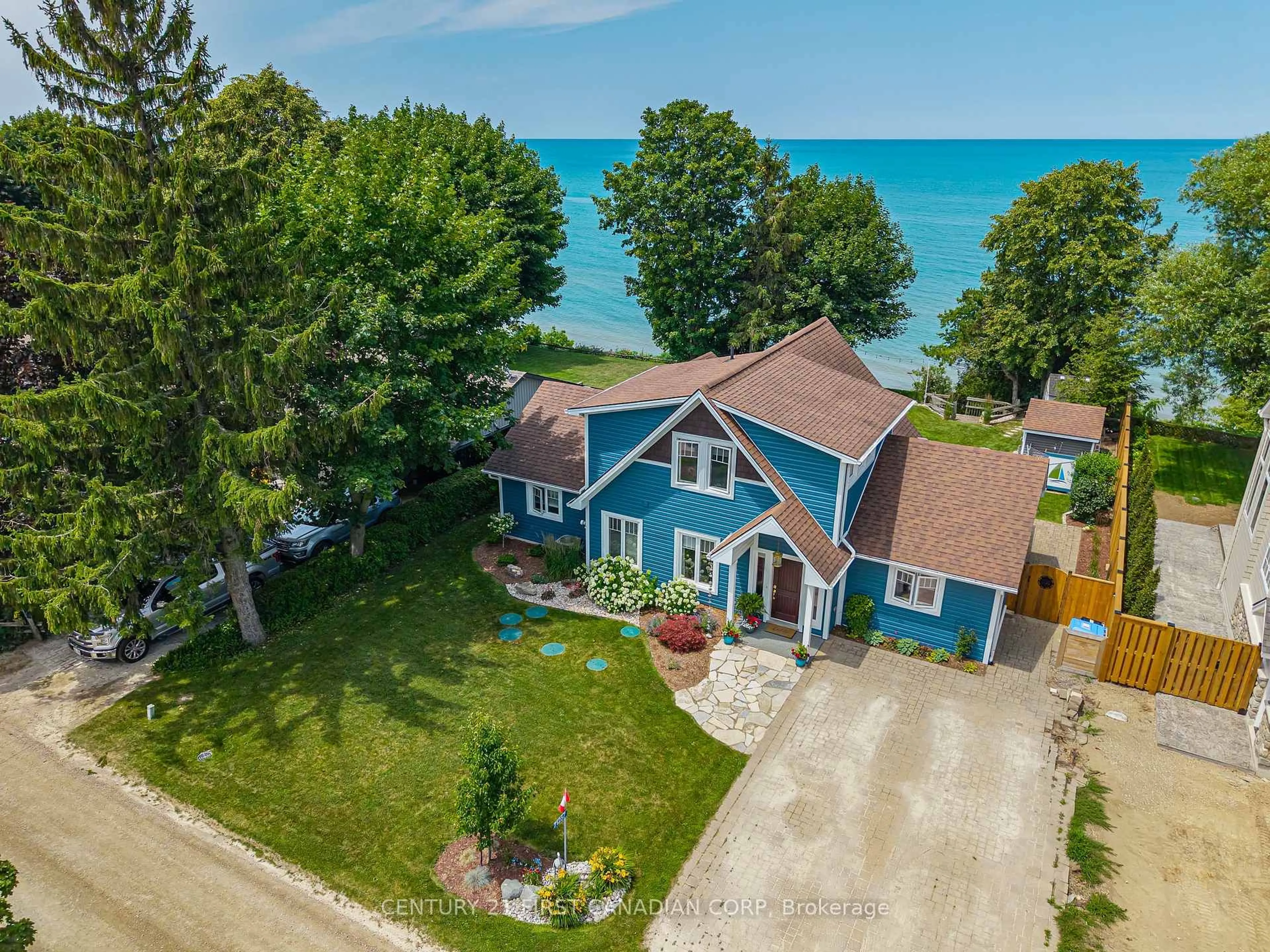 A pic from outside/outdoor area/front of a property/back of a property/a pic from drone, water/lake/river/ocean view for 71257 Elizabeth St, Bluewater Ontario N0M 1N0