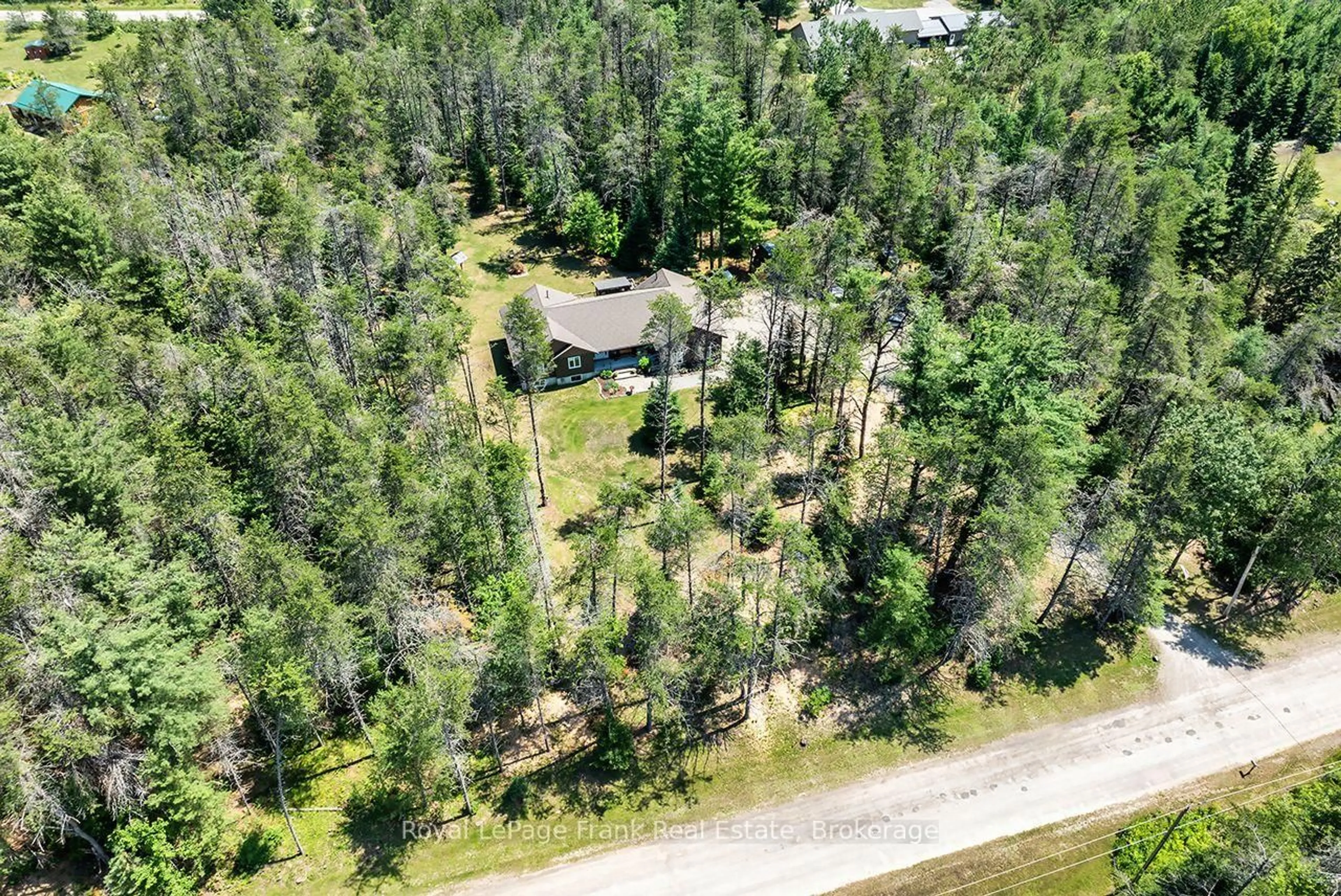 A pic from outside/outdoor area/front of a property/back of a property/a pic from drone, forest/trees view for 30 Hodgson Dr, Kawartha Lakes Ontario K0M 1C0