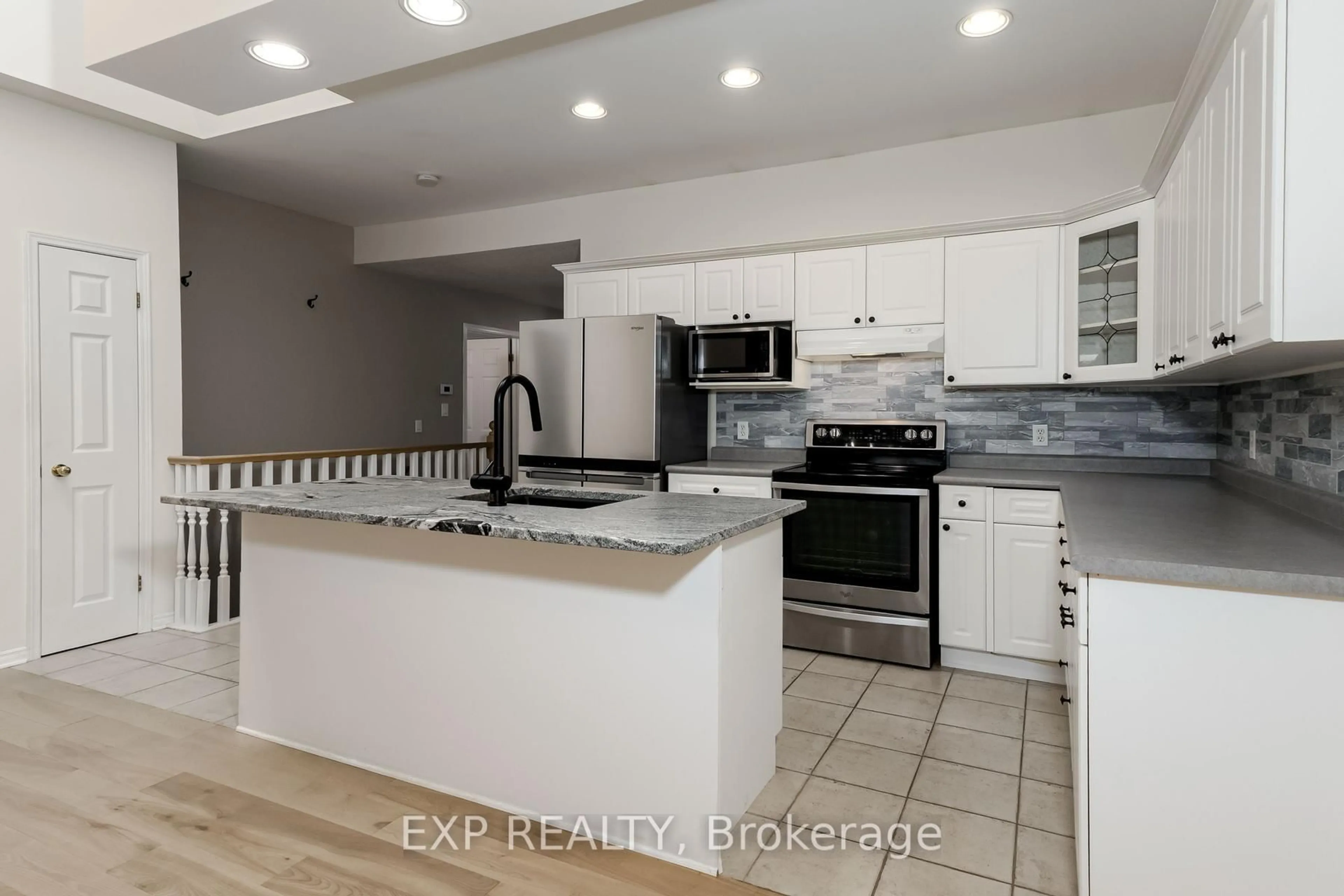 Open concept kitchen, ceramic/tile floor for 1337 Commissioners Rd #17, London South Ontario N6K 4V2