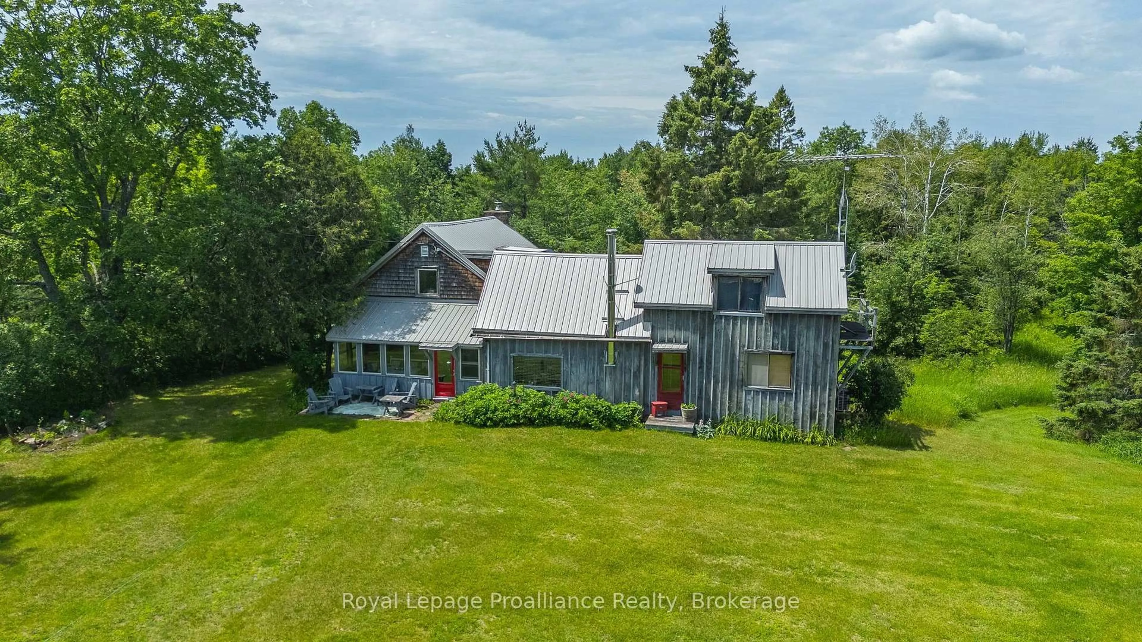 A pic from outside/outdoor area/front of a property/back of a property/a pic from drone, water/lake/river/ocean view for 452 Lasswade Rd, North Kawartha Ontario K0L 1A0