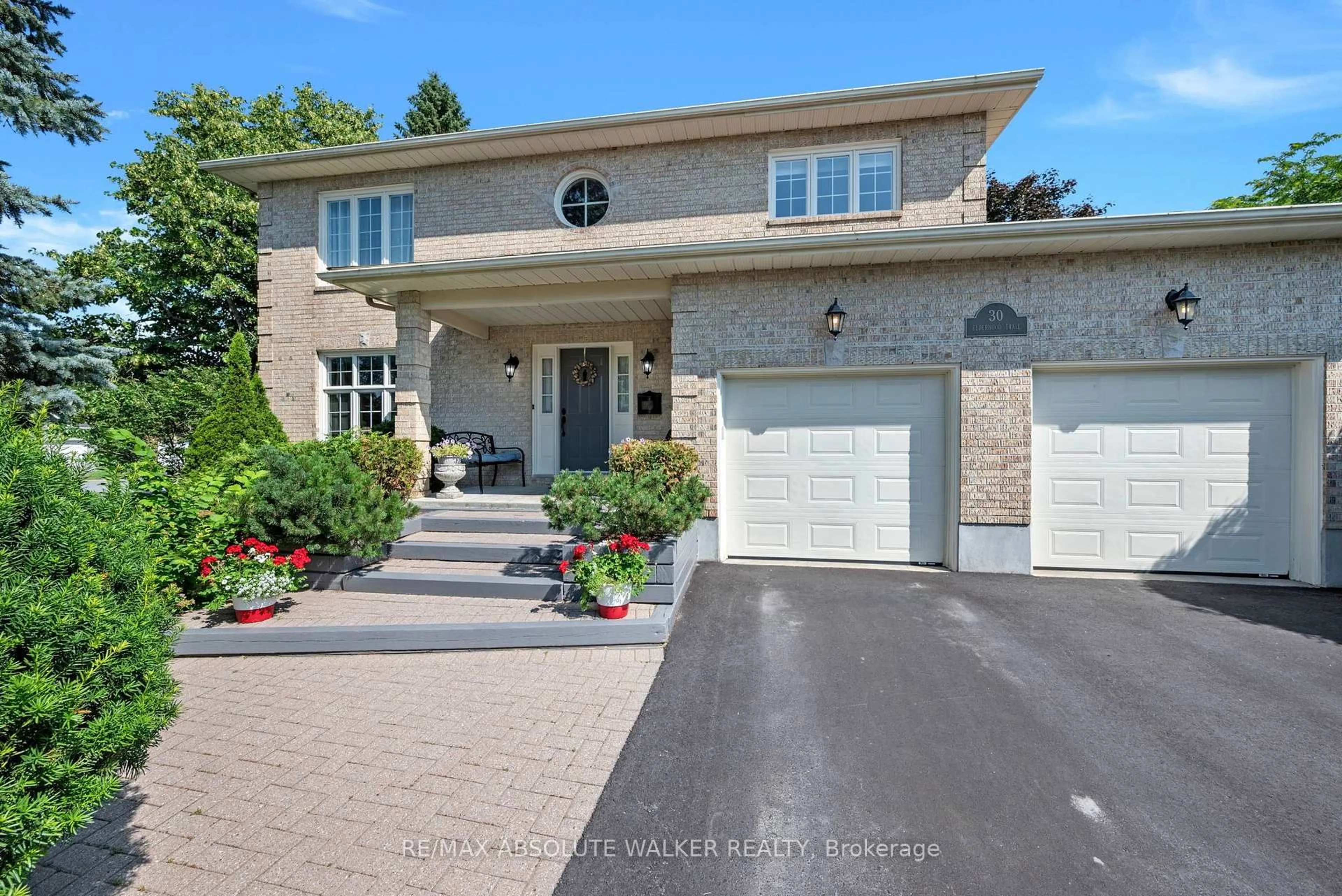 Home with brick exterior material, street for 30 Elderwood Tr, Ottawa Ontario K2S 1C9
