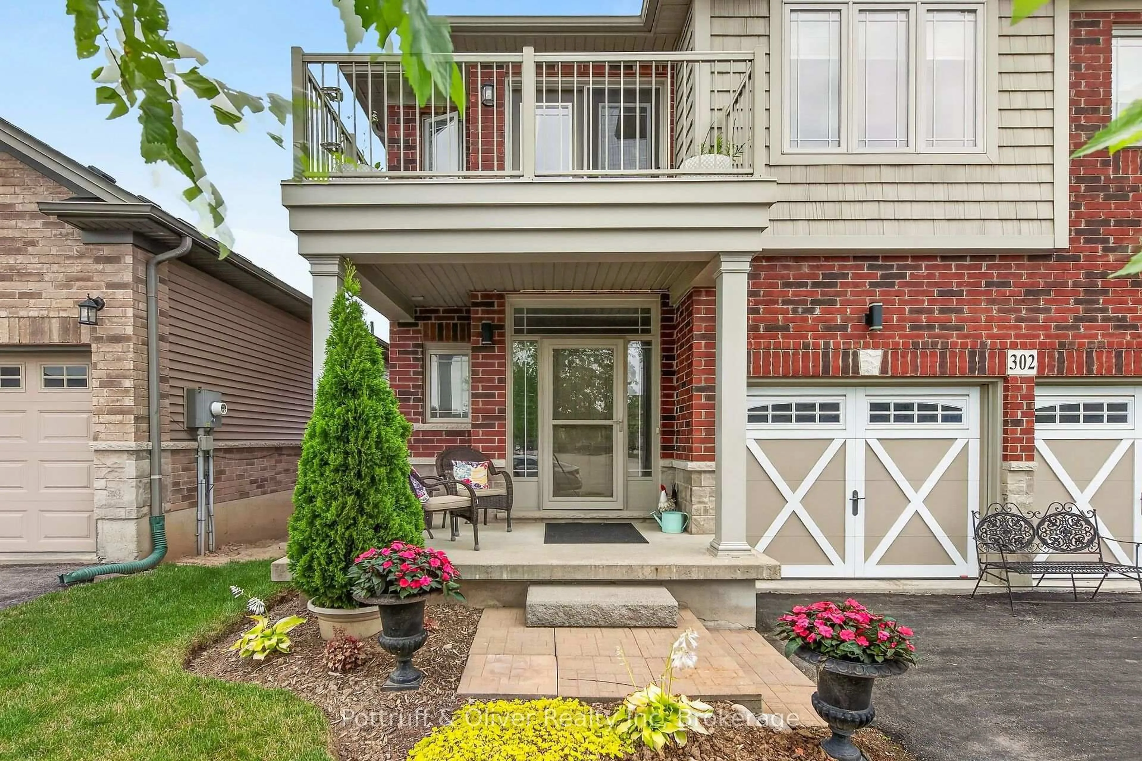 Home with brick exterior material, street for 302 Festival Way, Hamilton Ontario L0R 1C0