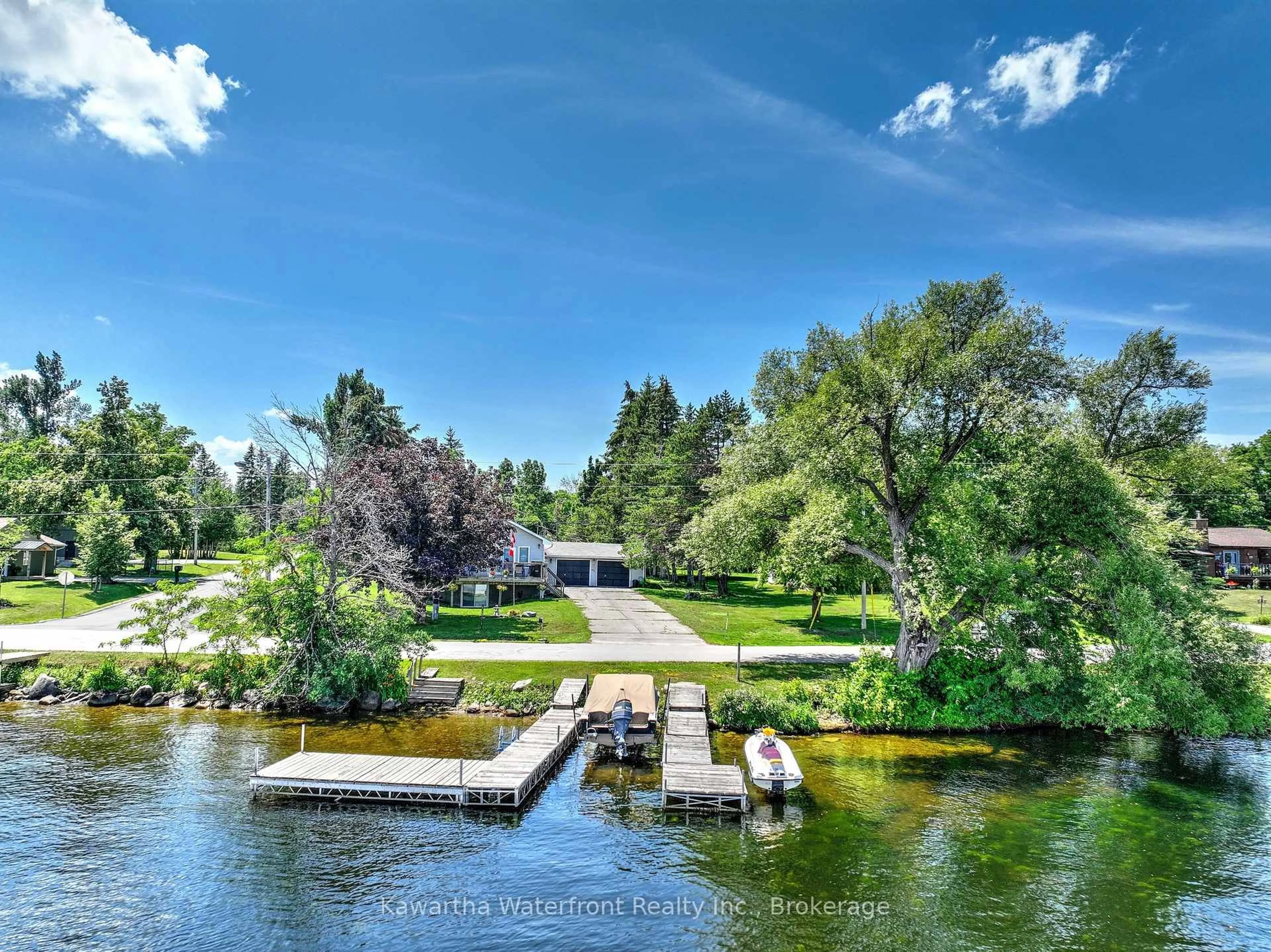 A pic from outside/outdoor area/front of a property/back of a property/a pic from drone, water/lake/river/ocean view for 519 Long Beach Rd, Kawartha Lakes Ontario K0M 1G0