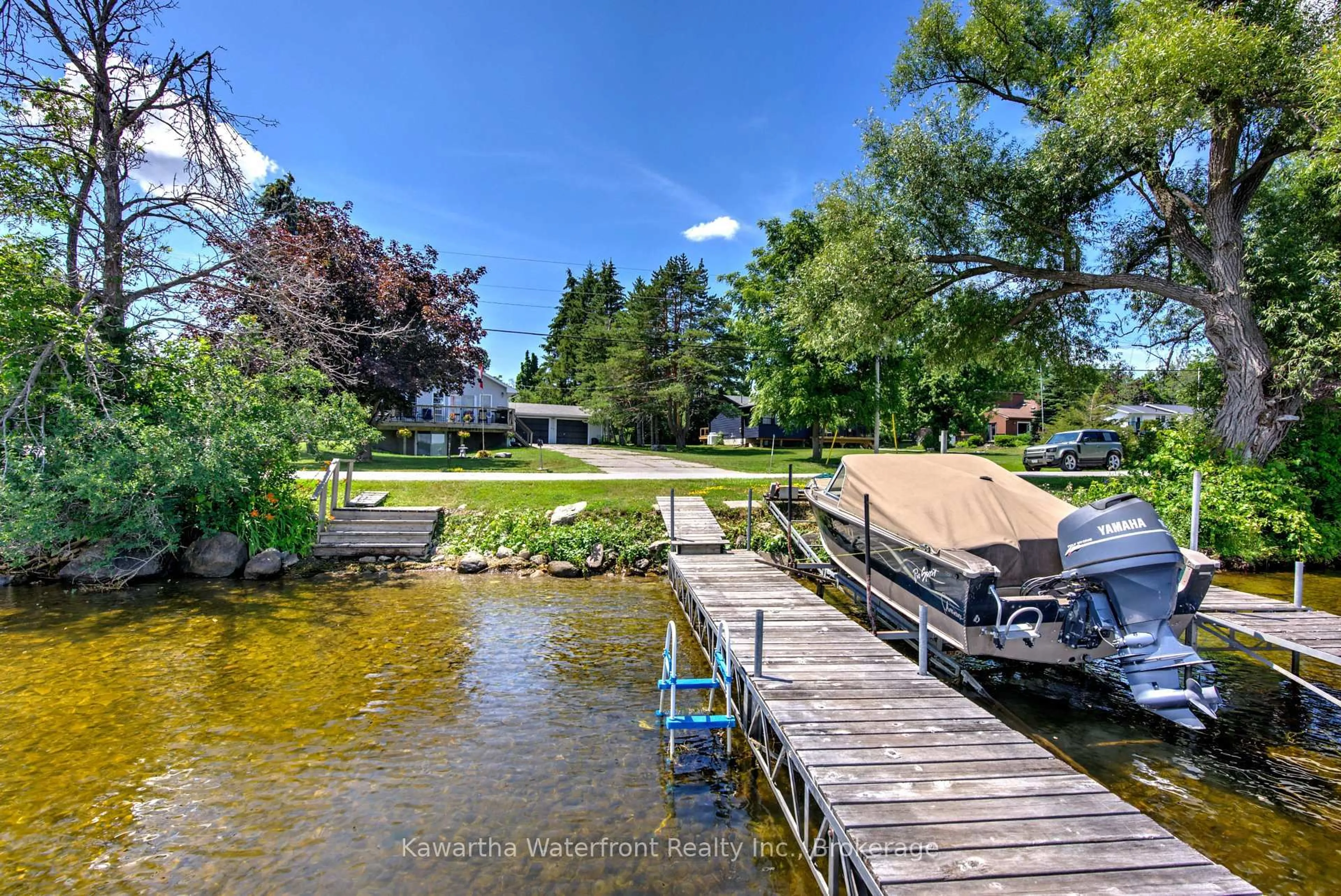 A pic from outside/outdoor area/front of a property/back of a property/a pic from drone, water/lake/river/ocean view for 519 Long Beach Rd, Kawartha Lakes Ontario K0M 1G0