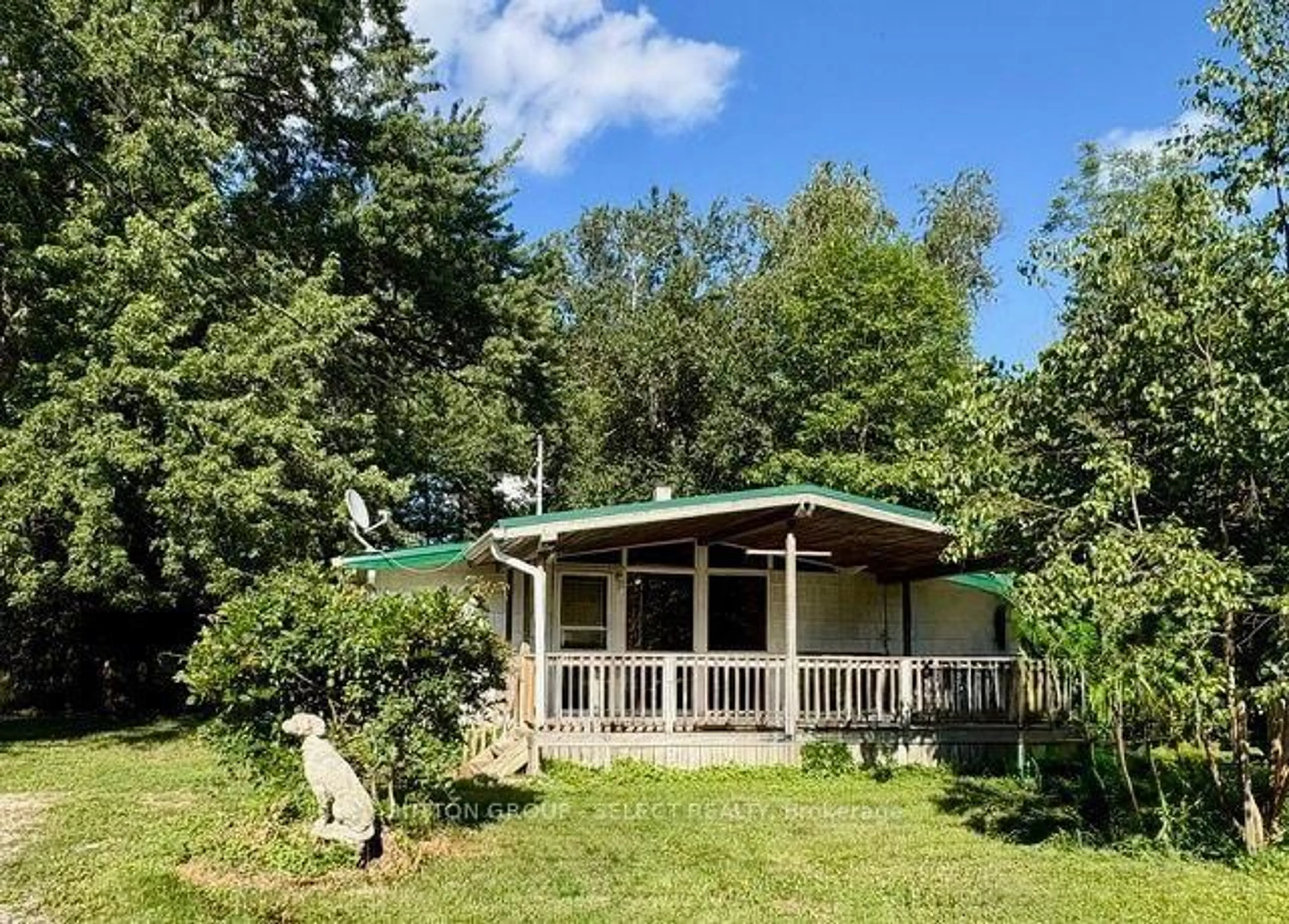 A pic from outside/outdoor area/front of a property/back of a property/a pic from drone, forest/trees view for 21060 Riverview Dr, Thames Centre Ontario N0M 2P0