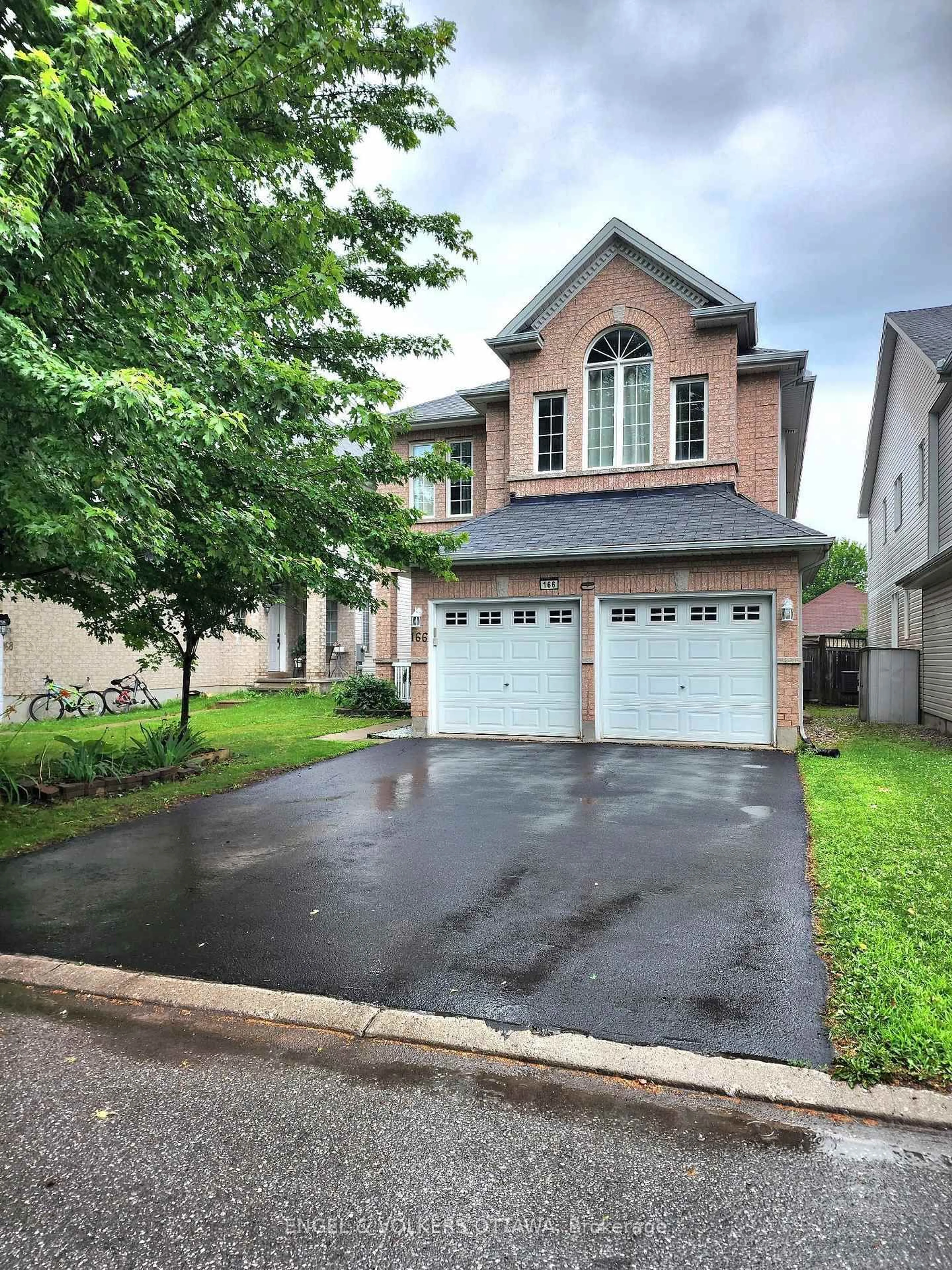 Home with brick exterior material, street for 166 Macara Cres, Kanata Ontario K2K 0C9