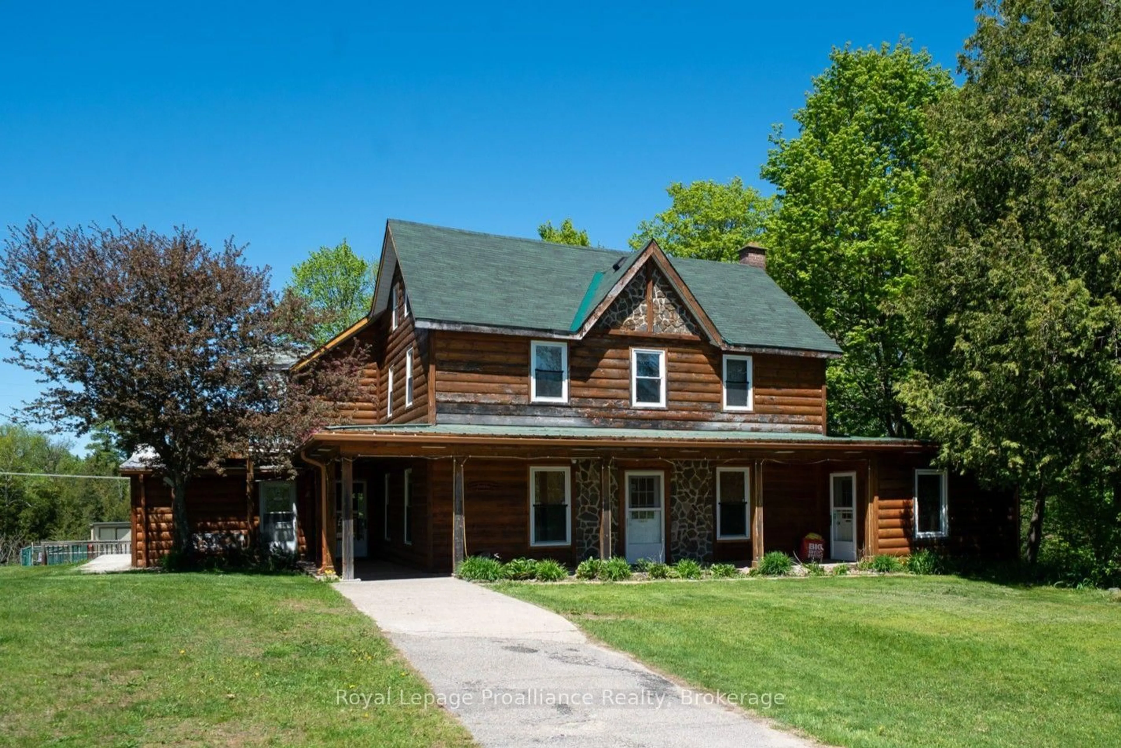 Home with vinyl exterior material, street for 2471 Road 509, Cloyne Ontario K0H 1K0