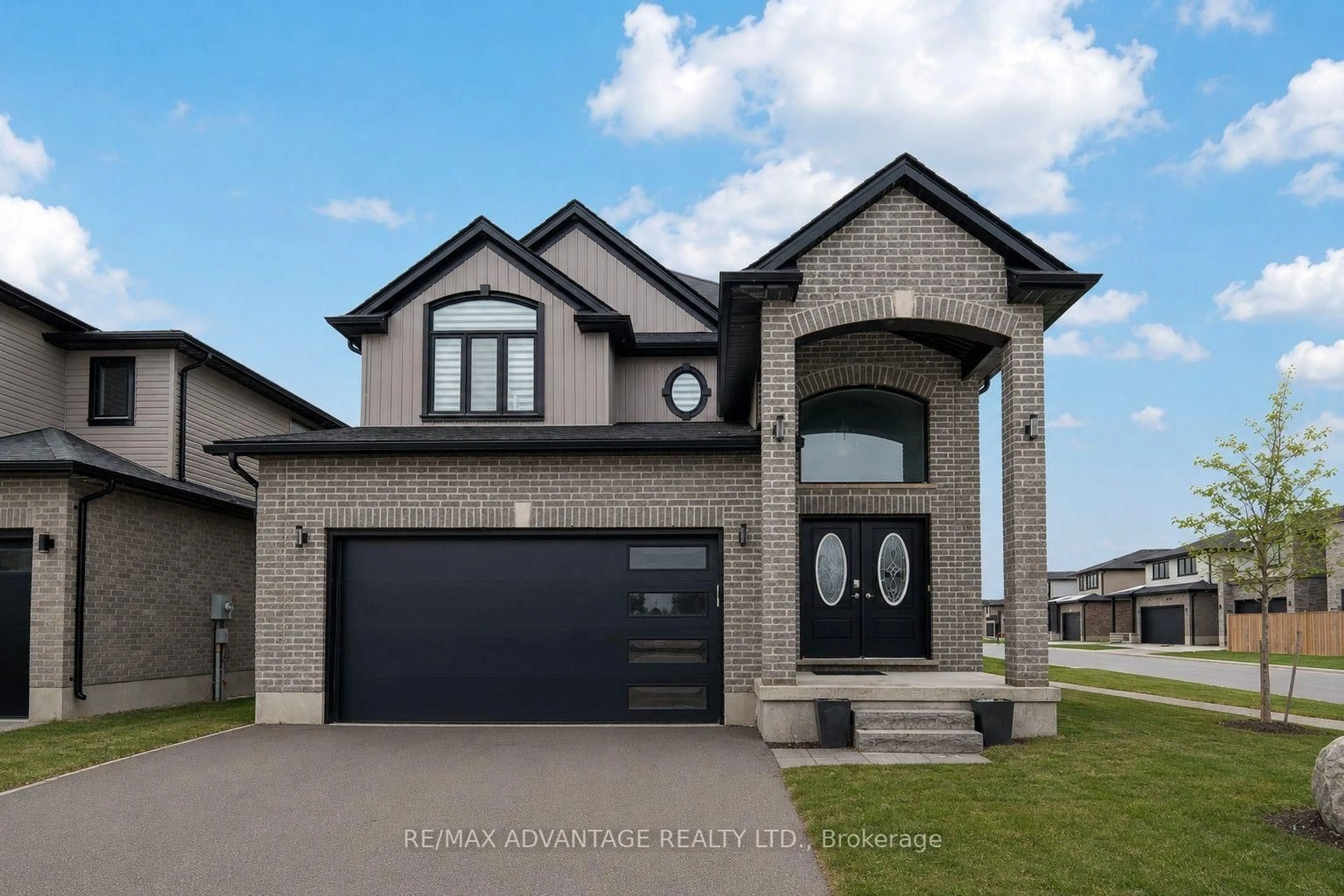 Home with brick exterior material, street for 3091 Tokala Tr, London North Ontario N6G 0S7