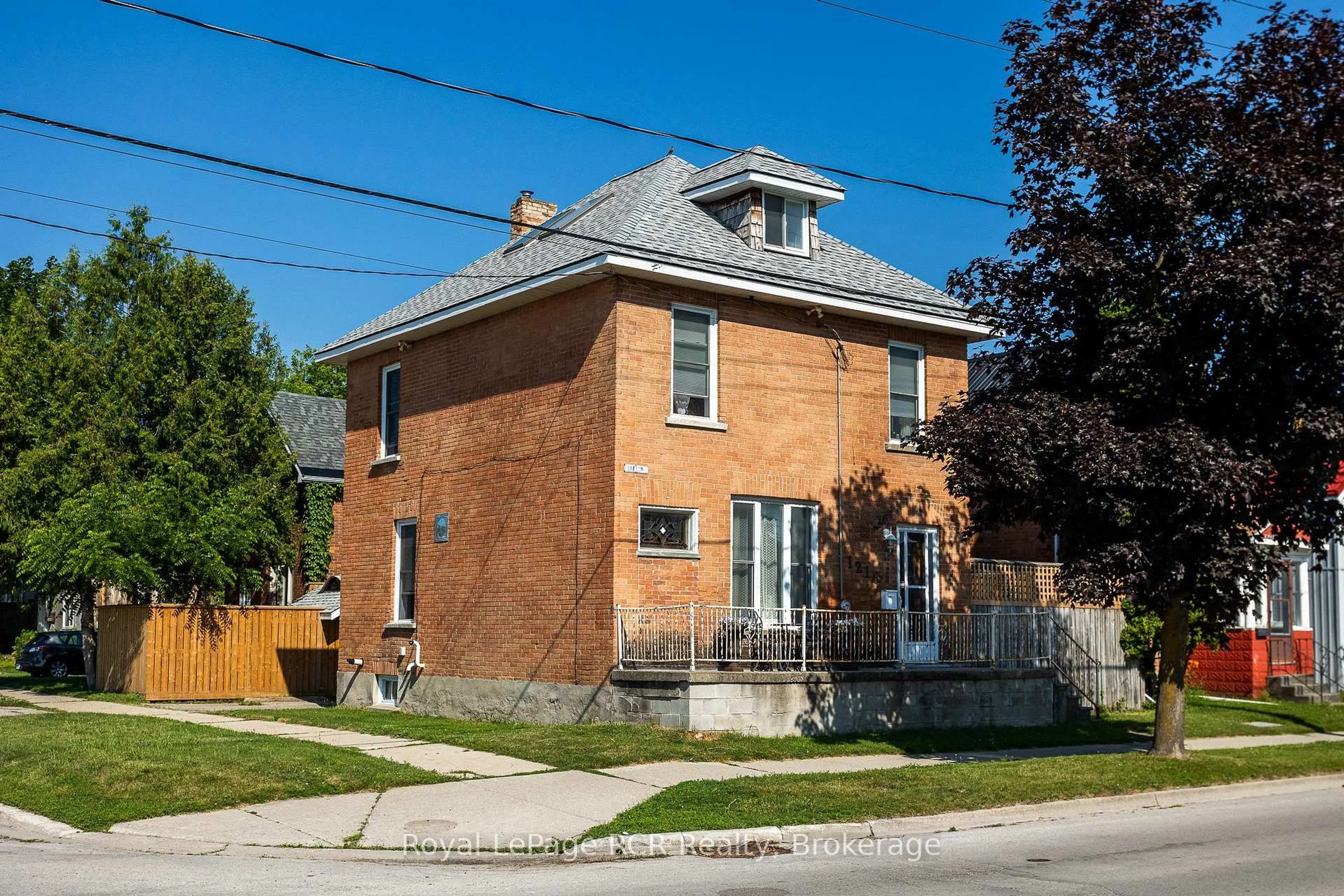 Home with brick exterior material, street for 1218 1st Ave, Owen Sound Ontario N4K 4L1