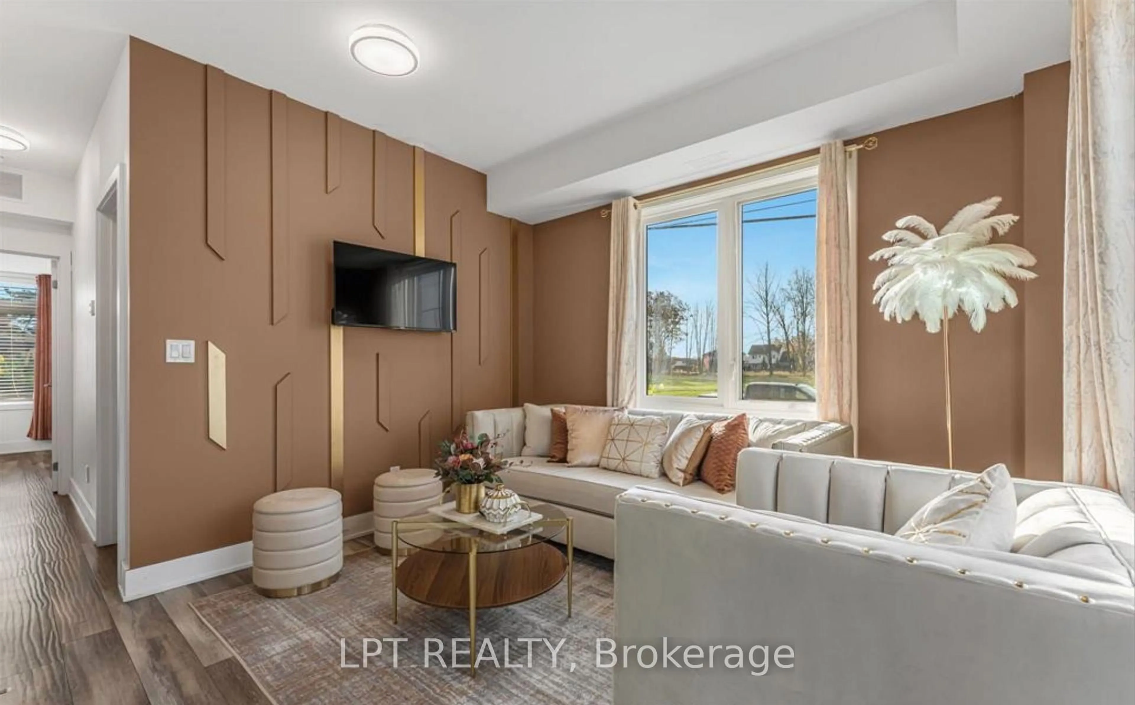 Living room with furniture, unknown for 6065 MCLEOD Rd #213, Niagara Falls Ontario L2G 0Z7