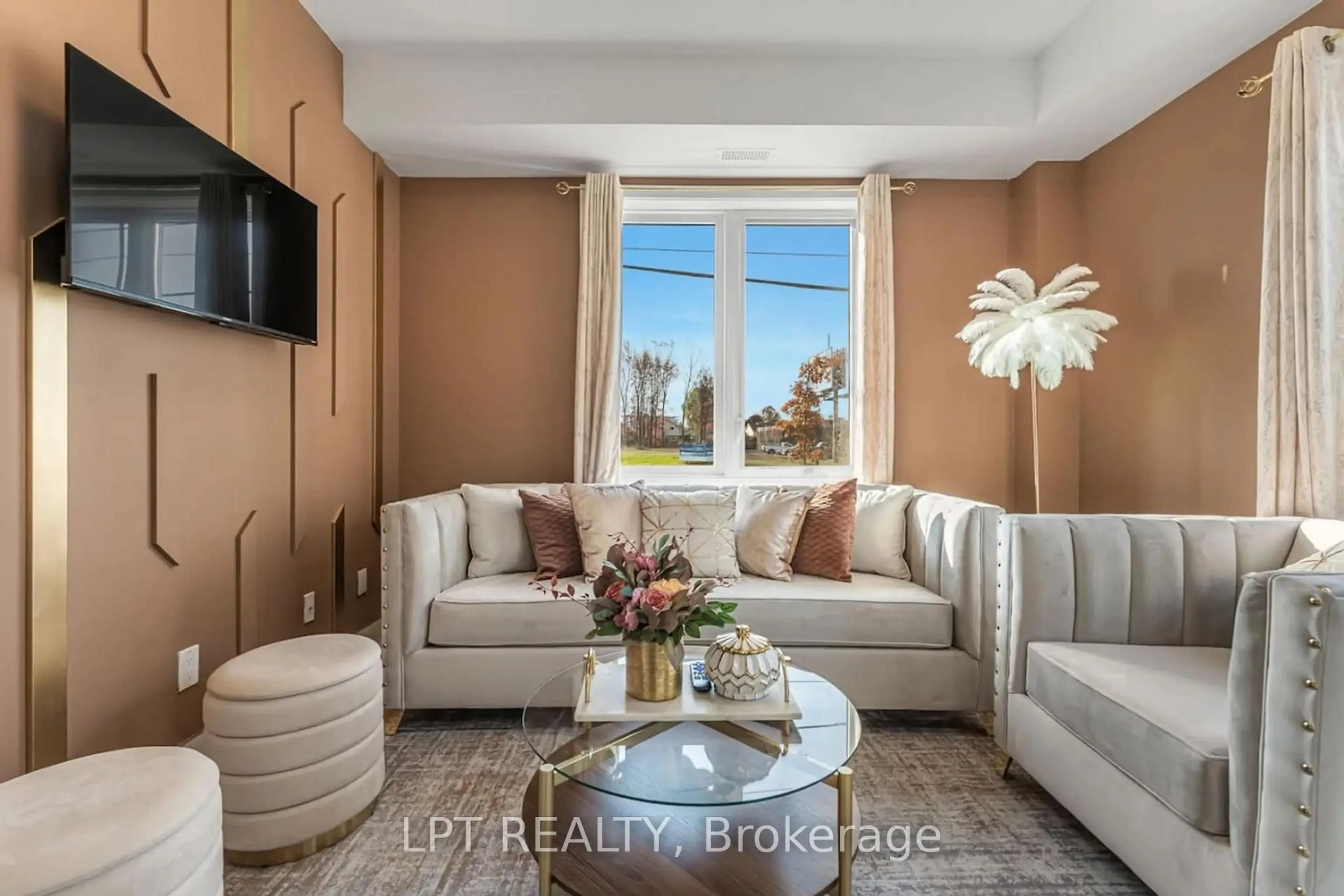 Living room with furniture, unknown for 6065 MCLEOD Rd #213, Niagara Falls Ontario L2G 0Z7
