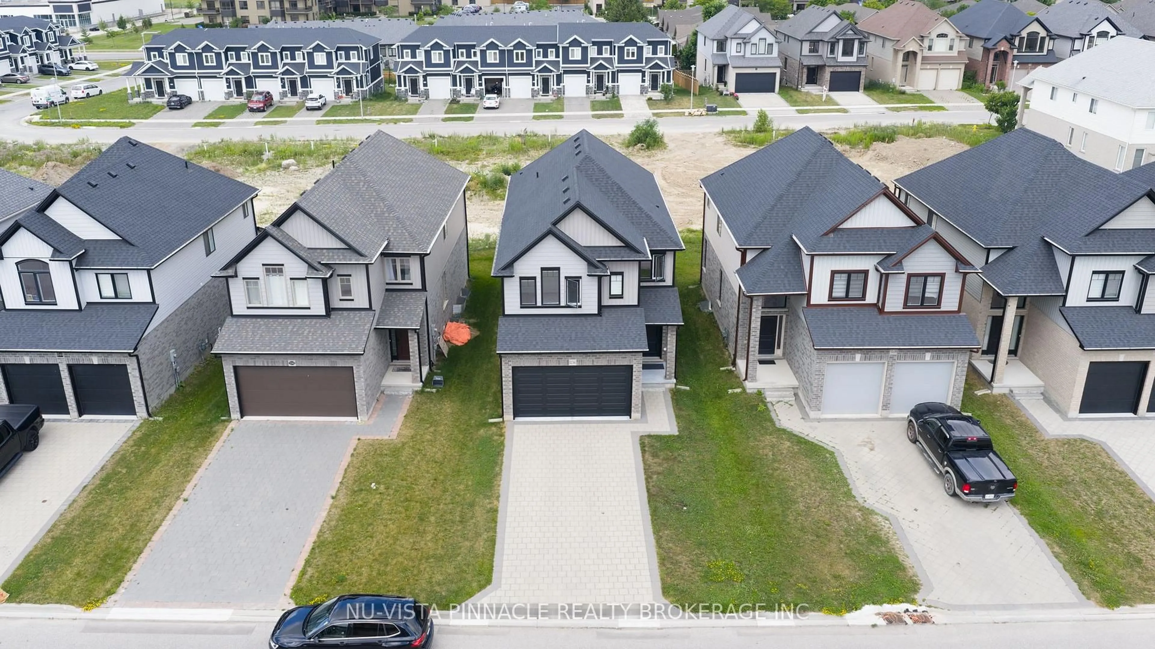 A pic from outside/outdoor area/front of a property/back of a property/a pic from drone, street for 1236 Emma Chse, London North Ontario N6G 5S1