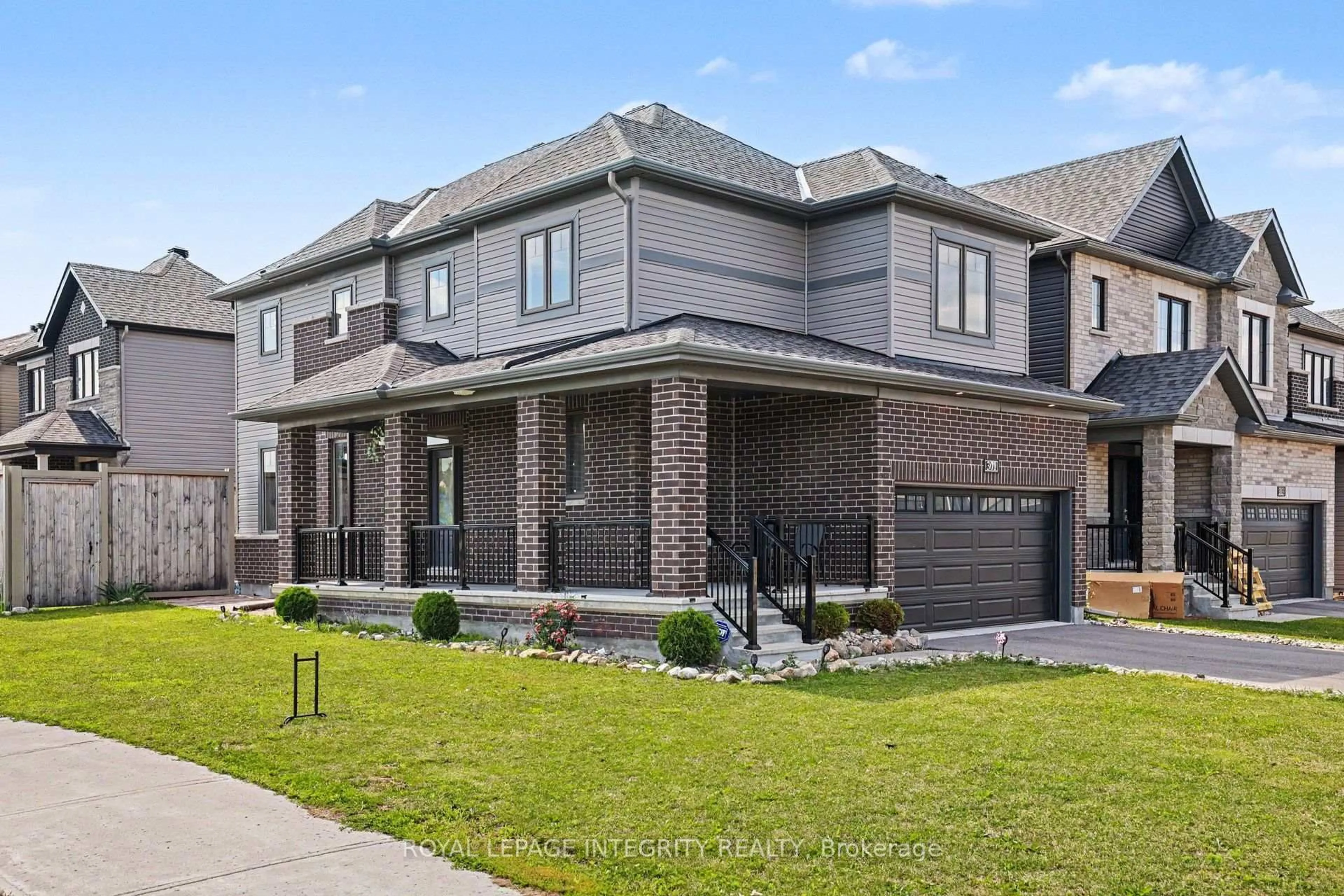 Home with brick exterior material, street for 301 Cloyne Cres, Ottawa Ontario K2J 6W3