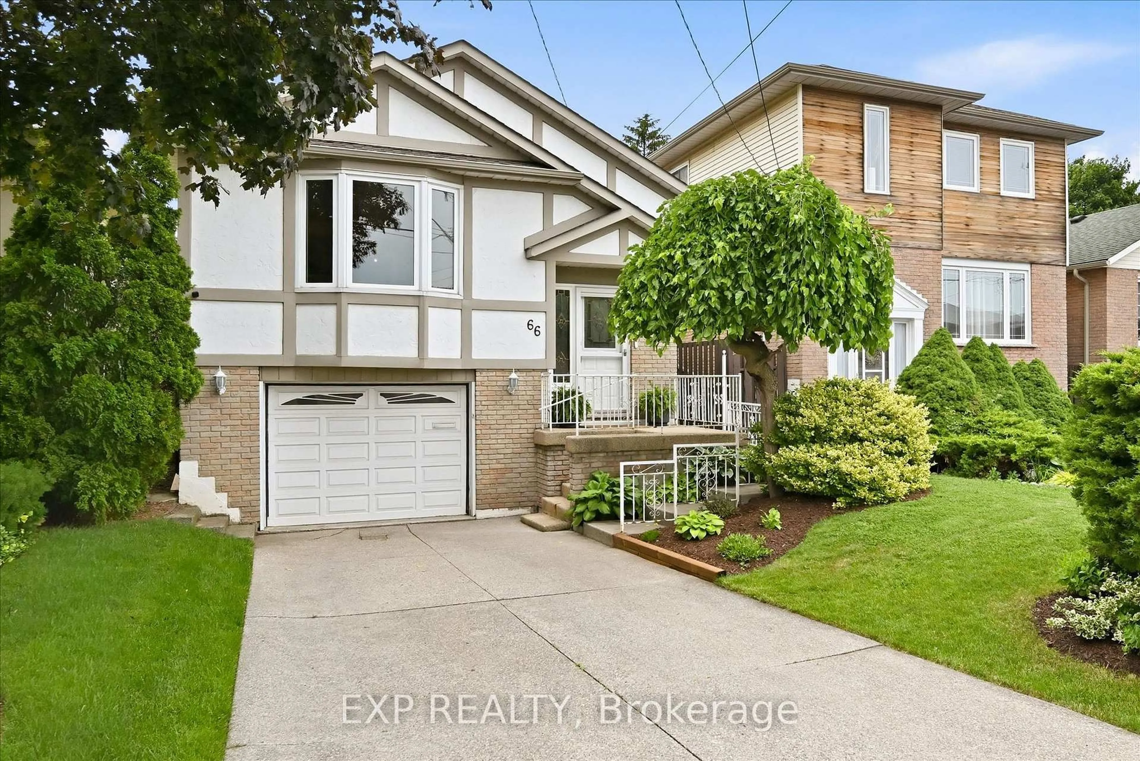 Home with brick exterior material, street for 66 Elmore Dr, Hamilton Ontario L8W 1T6