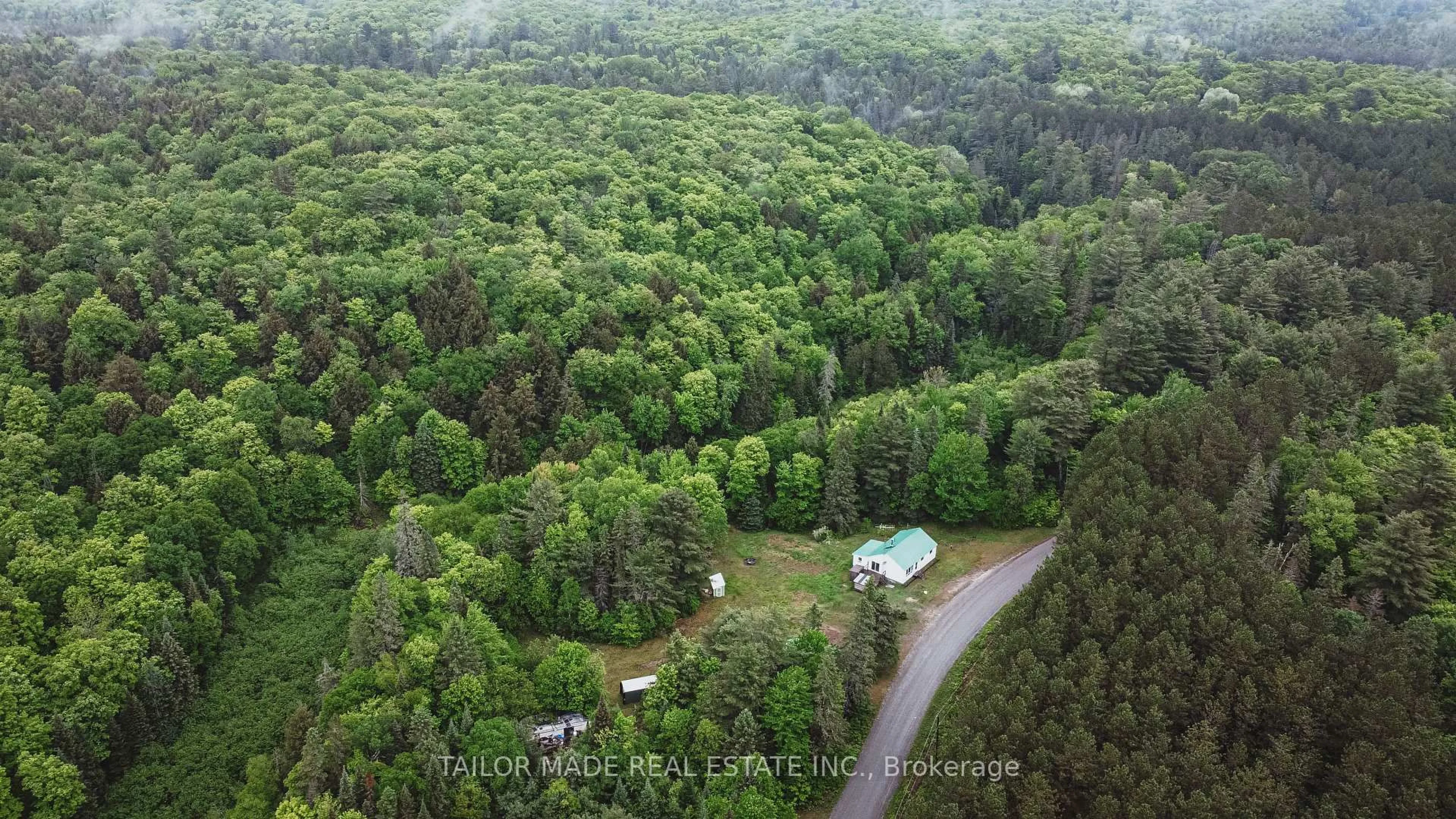 A pic from outside/outdoor area/front of a property/back of a property/a pic from drone, forest/trees view for 788 Bothams Rd, Magnetawan Ontario P0A 1P0