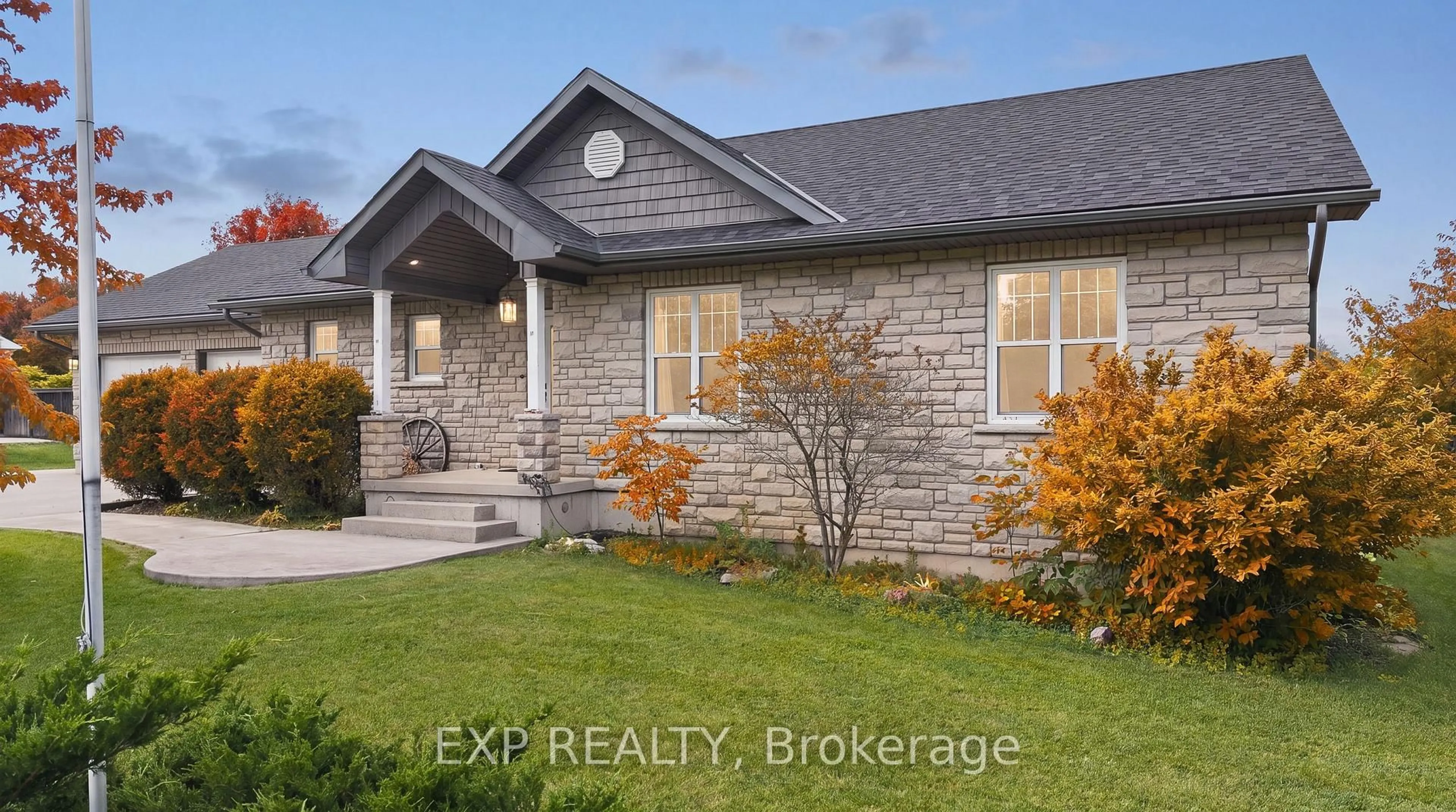 Home with brick exterior material, street for 14 Regency Dr, Minto Ontario N0G 1M0