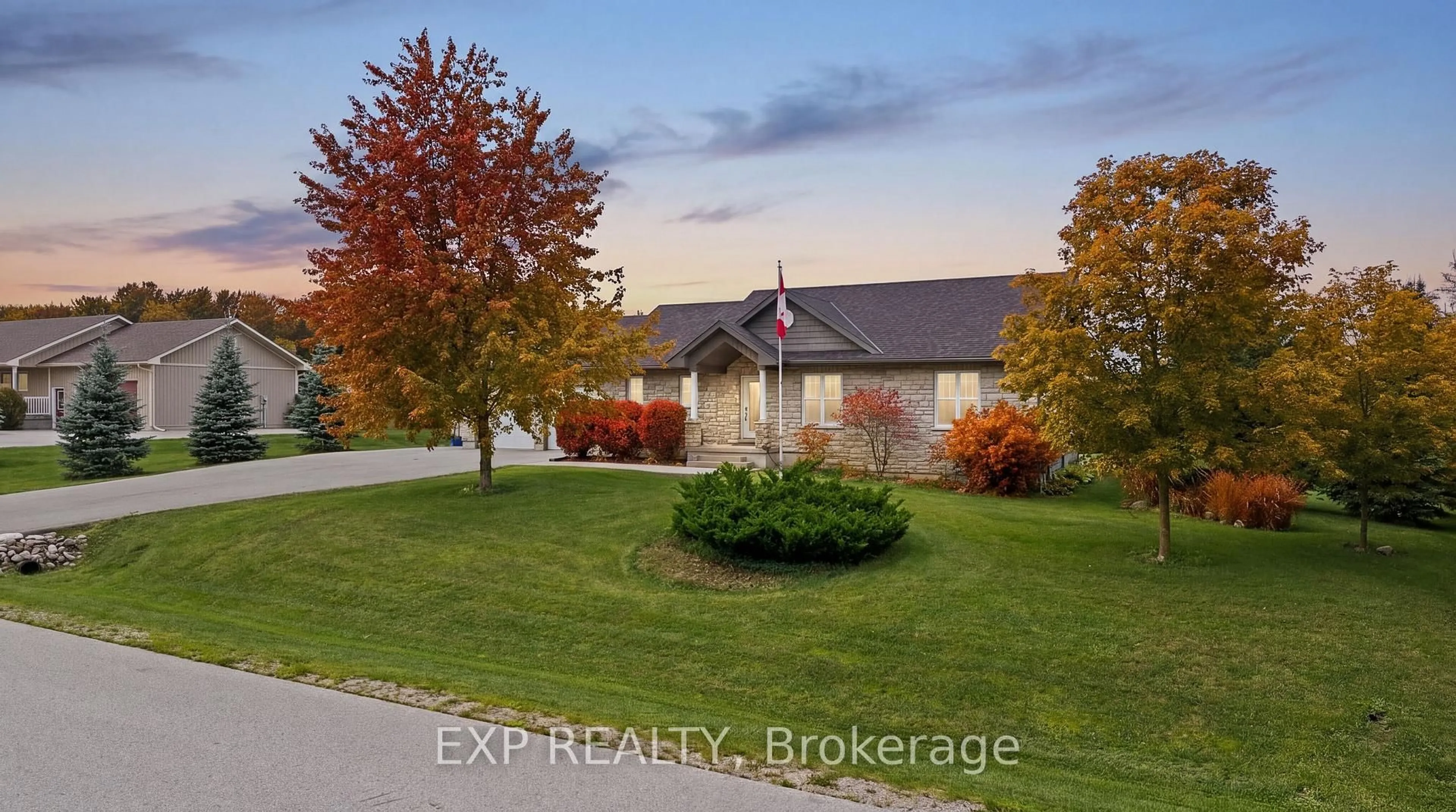 A pic from outside/outdoor area/front of a property/back of a property/a pic from drone, street for 14 Regency Dr, Minto Ontario N0G 1M0