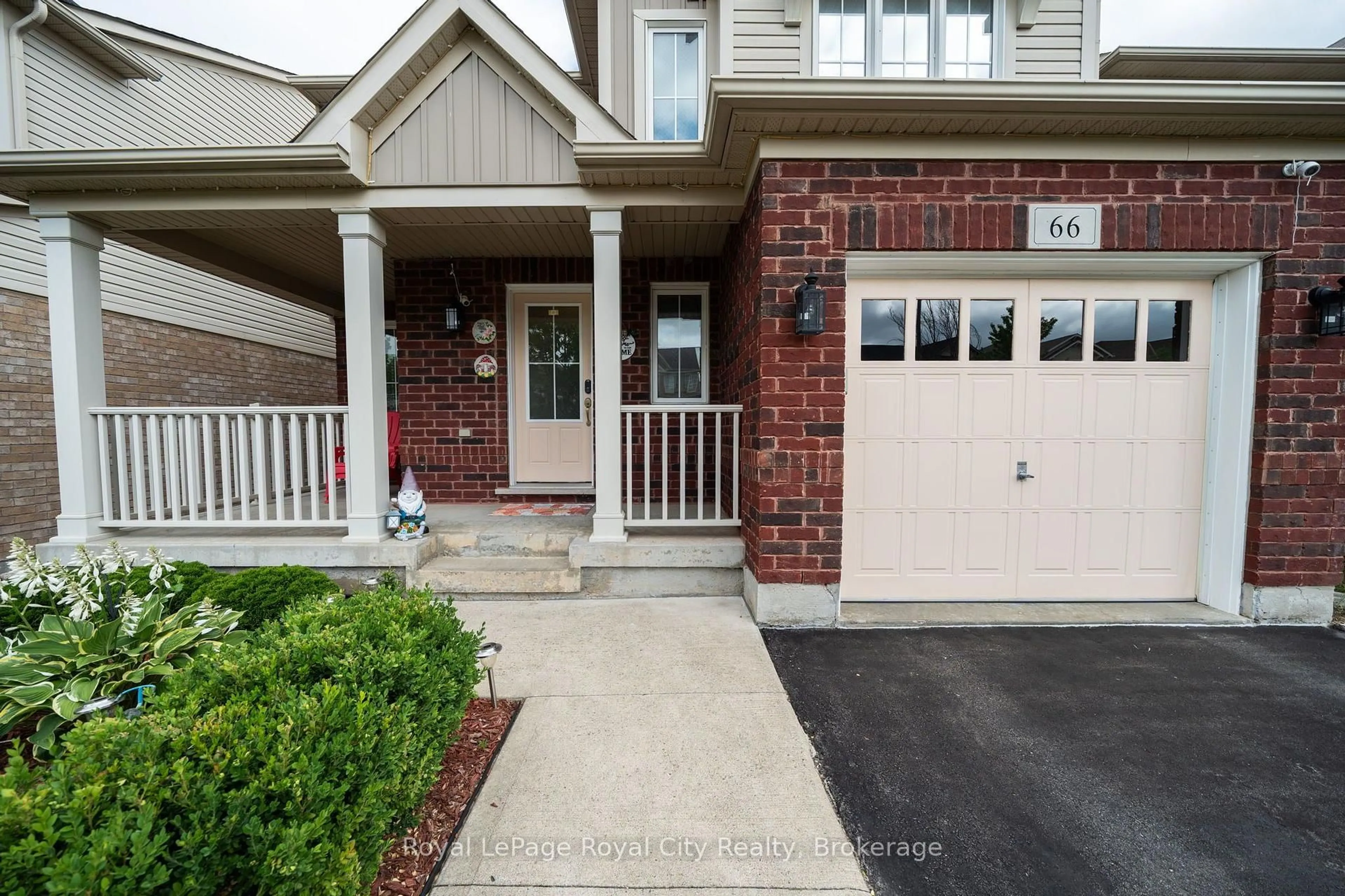 Home with brick exterior material, street for 66 Horton Walk, Cambridge Ontario N3C 0C7