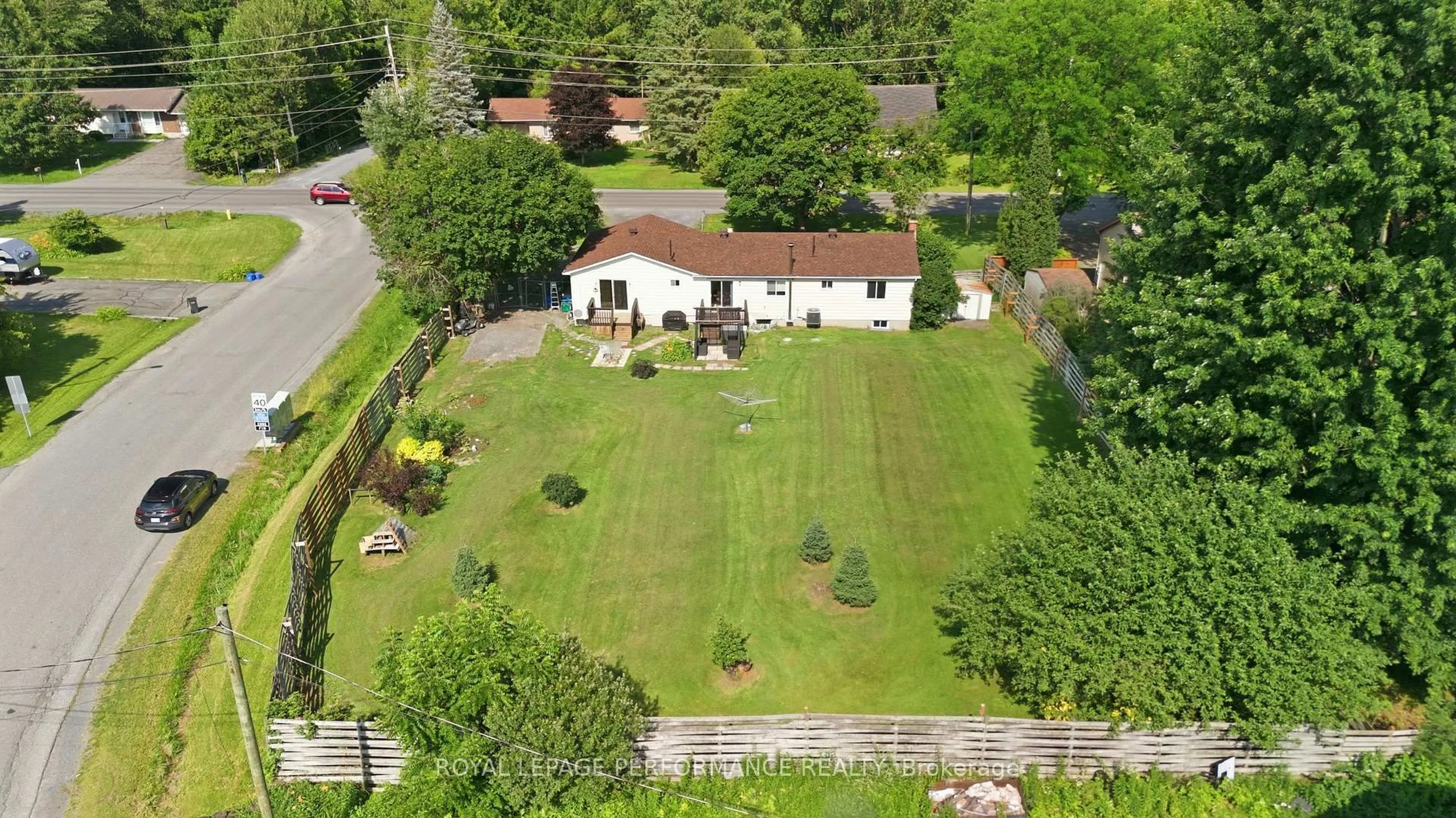 A pic from outside/outdoor area/front of a property/back of a property/a pic from drone, street for 1084 Eadie Rd, Russell Ontario K4R 1C3