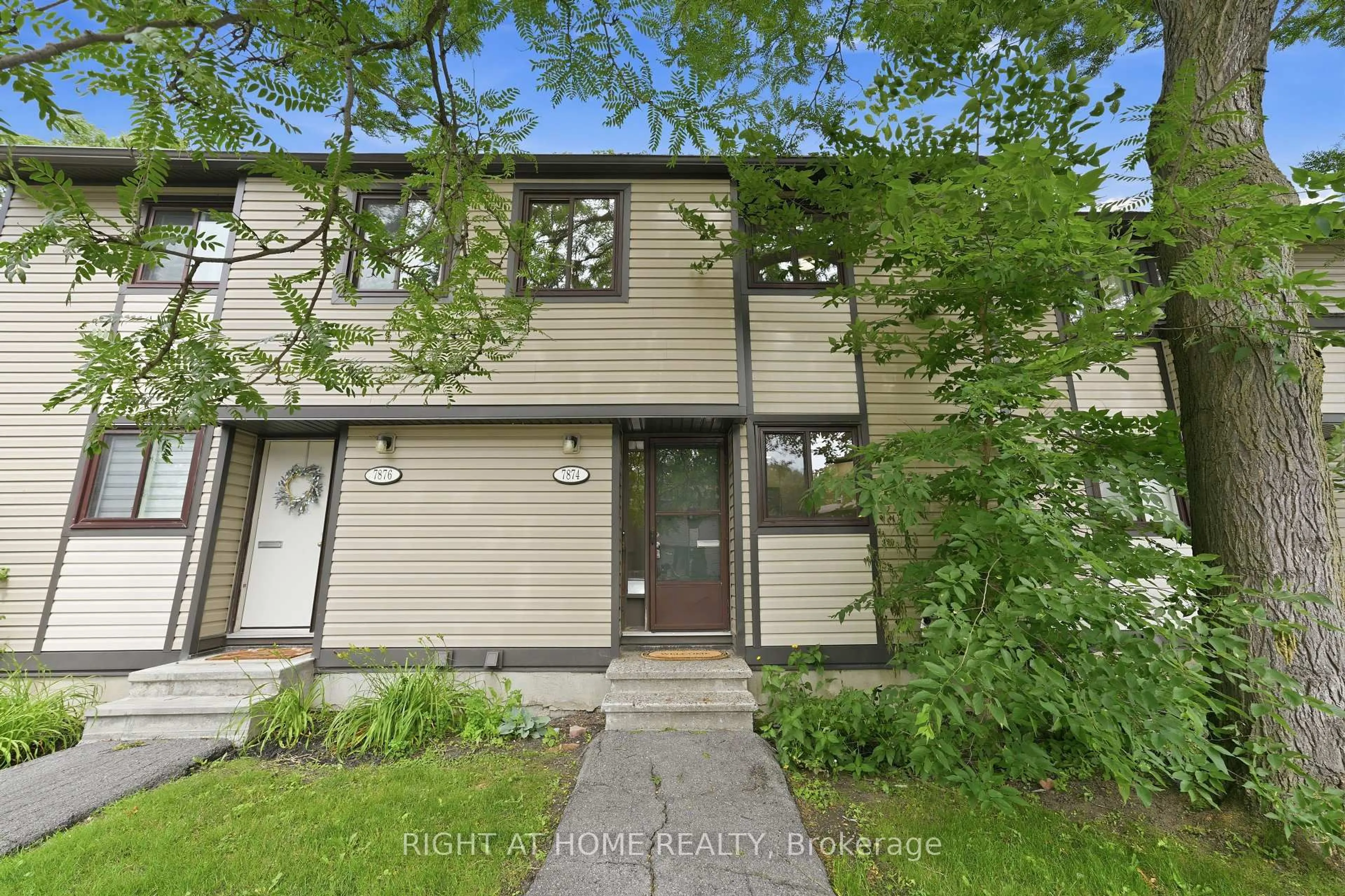 A pic from outside/outdoor area/front of a property/back of a property/a pic from drone, street for 7874 Jeanne D'arc Blvd #3, Ottawa Ontario K1C 2E9