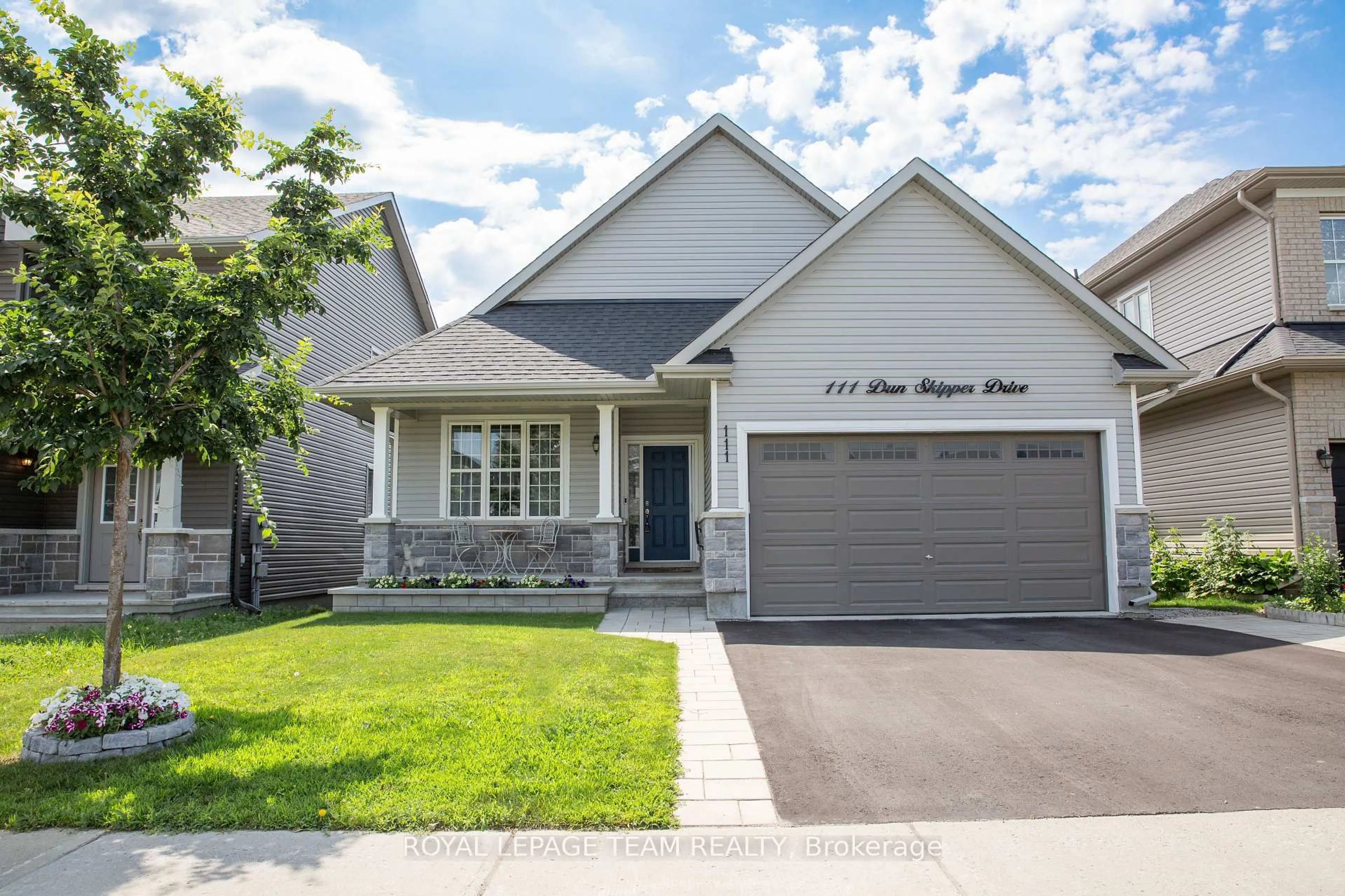 Home with vinyl exterior material, street for 111 Dun Skipper Dr, Ottawa Ontario K1X 0G1