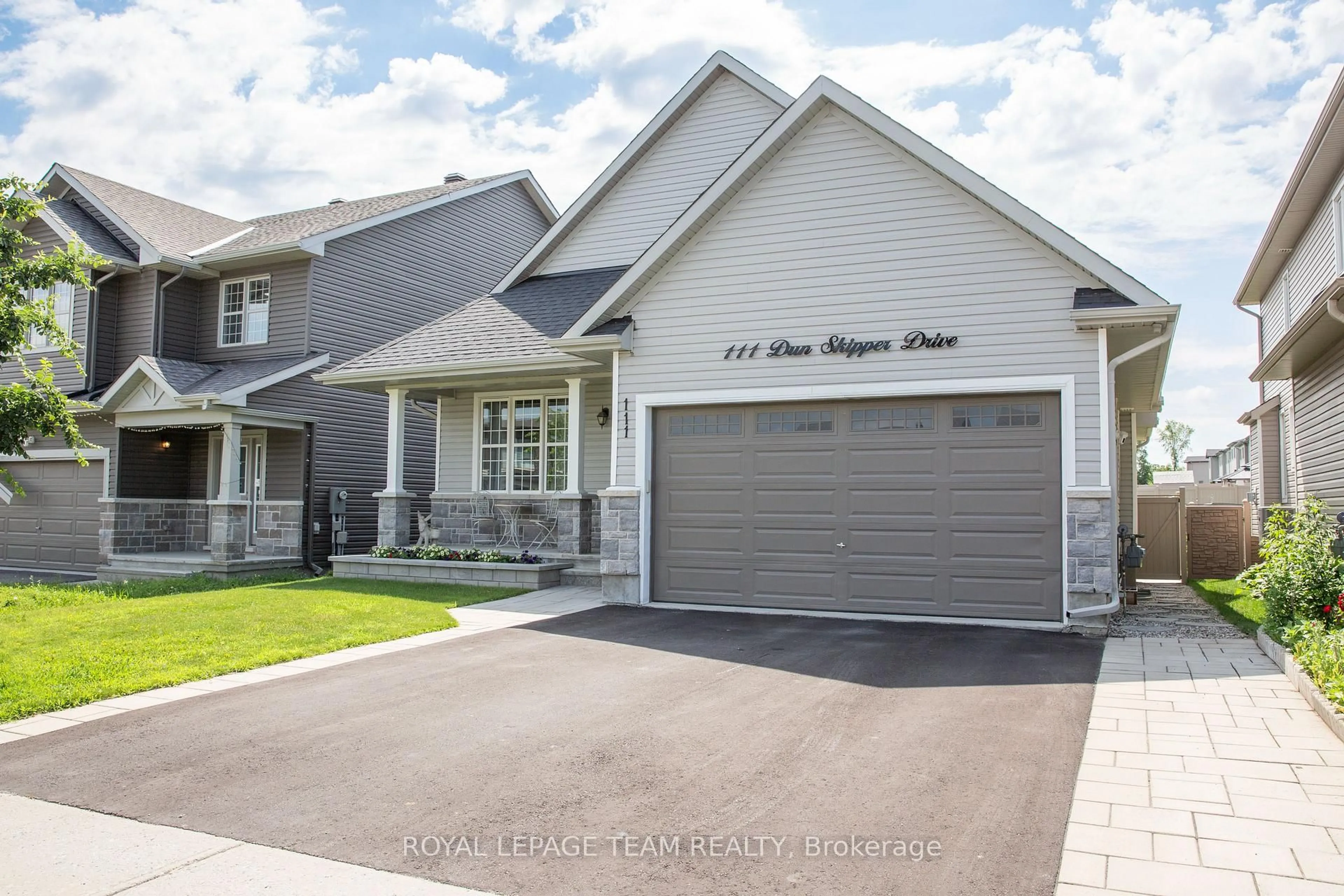Home with vinyl exterior material, street for 111 Dun Skipper Dr, Ottawa Ontario K1X 0G1