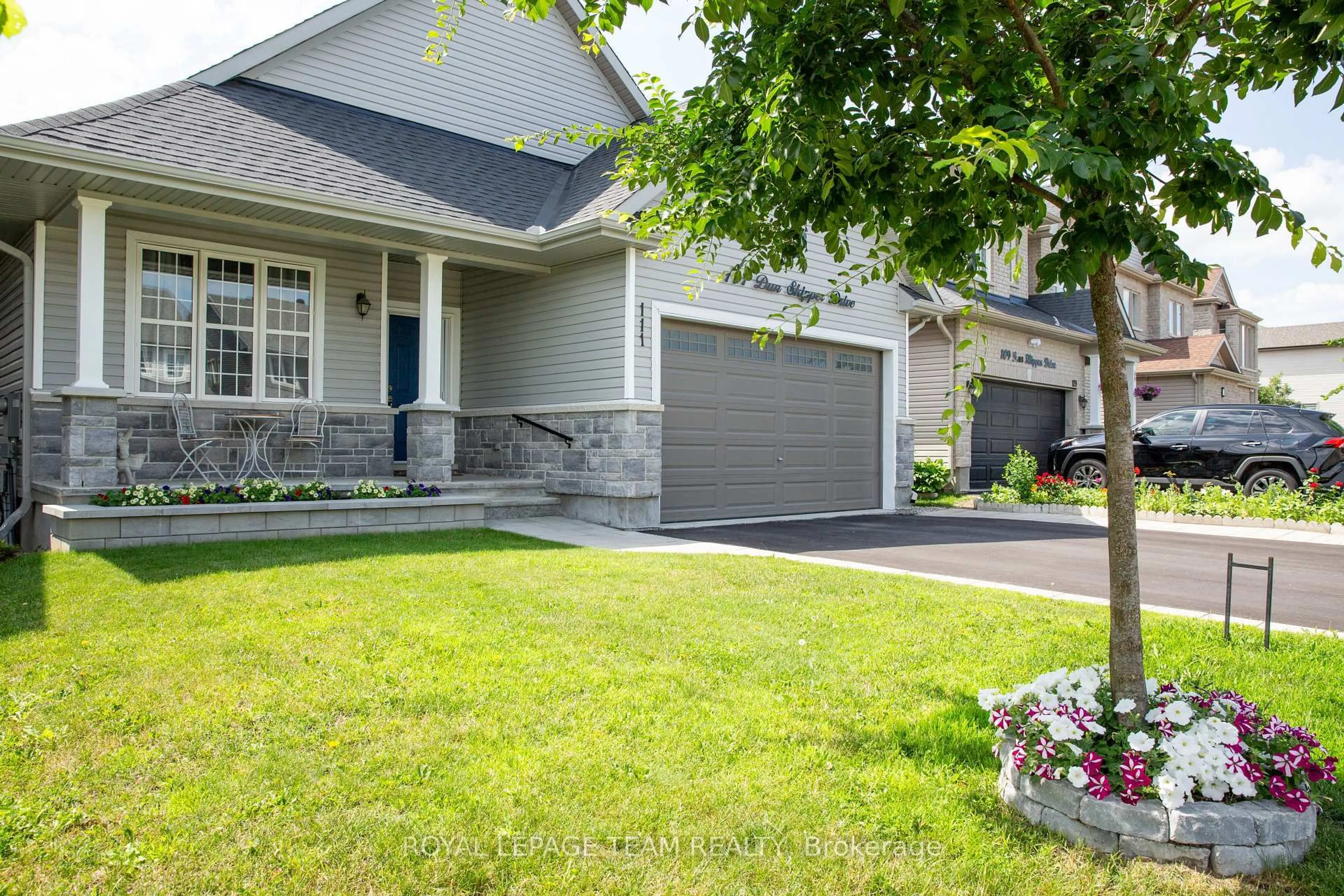 Home with vinyl exterior material, street for 111 Dun Skipper Dr, Ottawa Ontario K1X 0G1