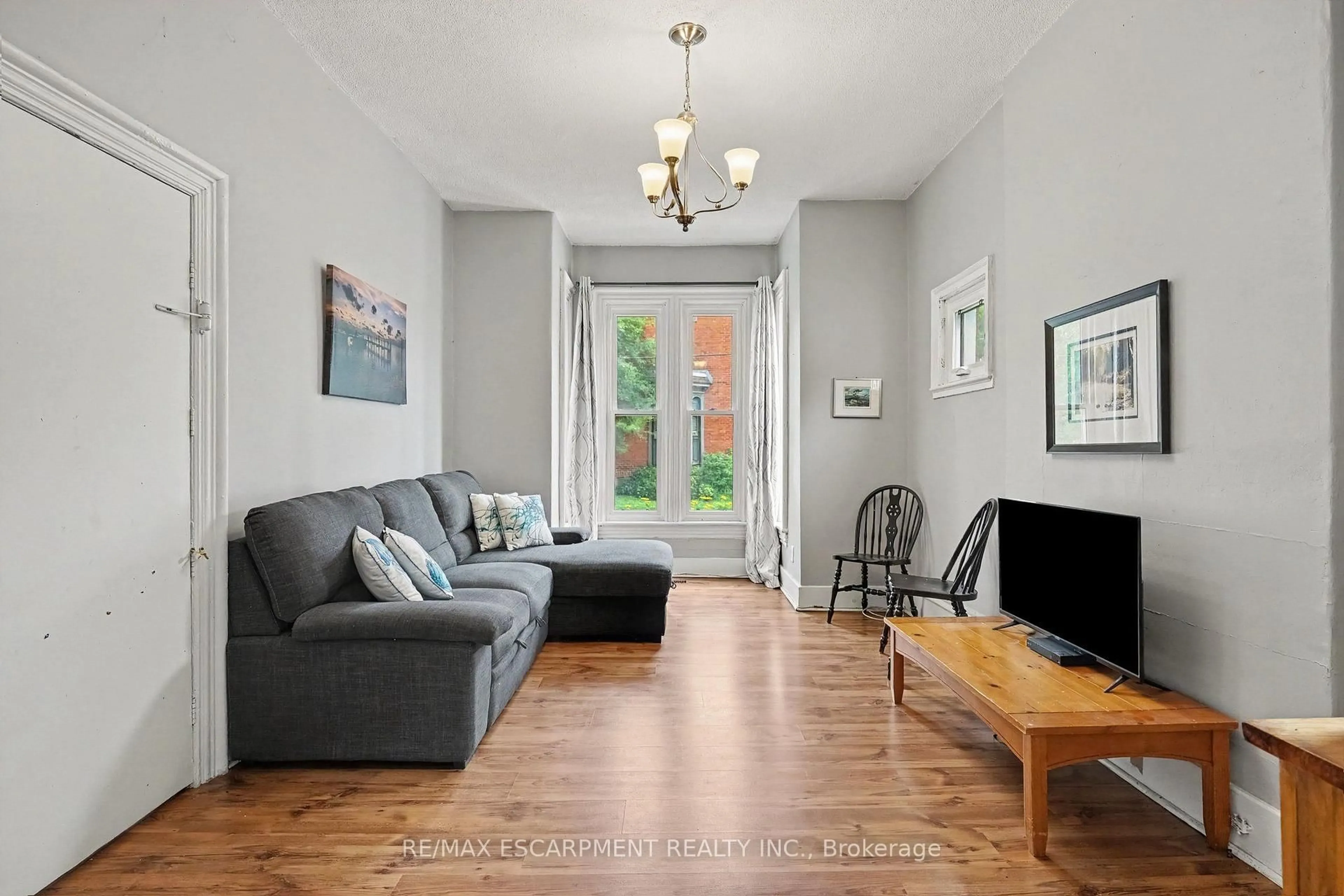 Living room with furniture, unknown for 22 Stinson St, Hamilton Ontario L8N 1R7