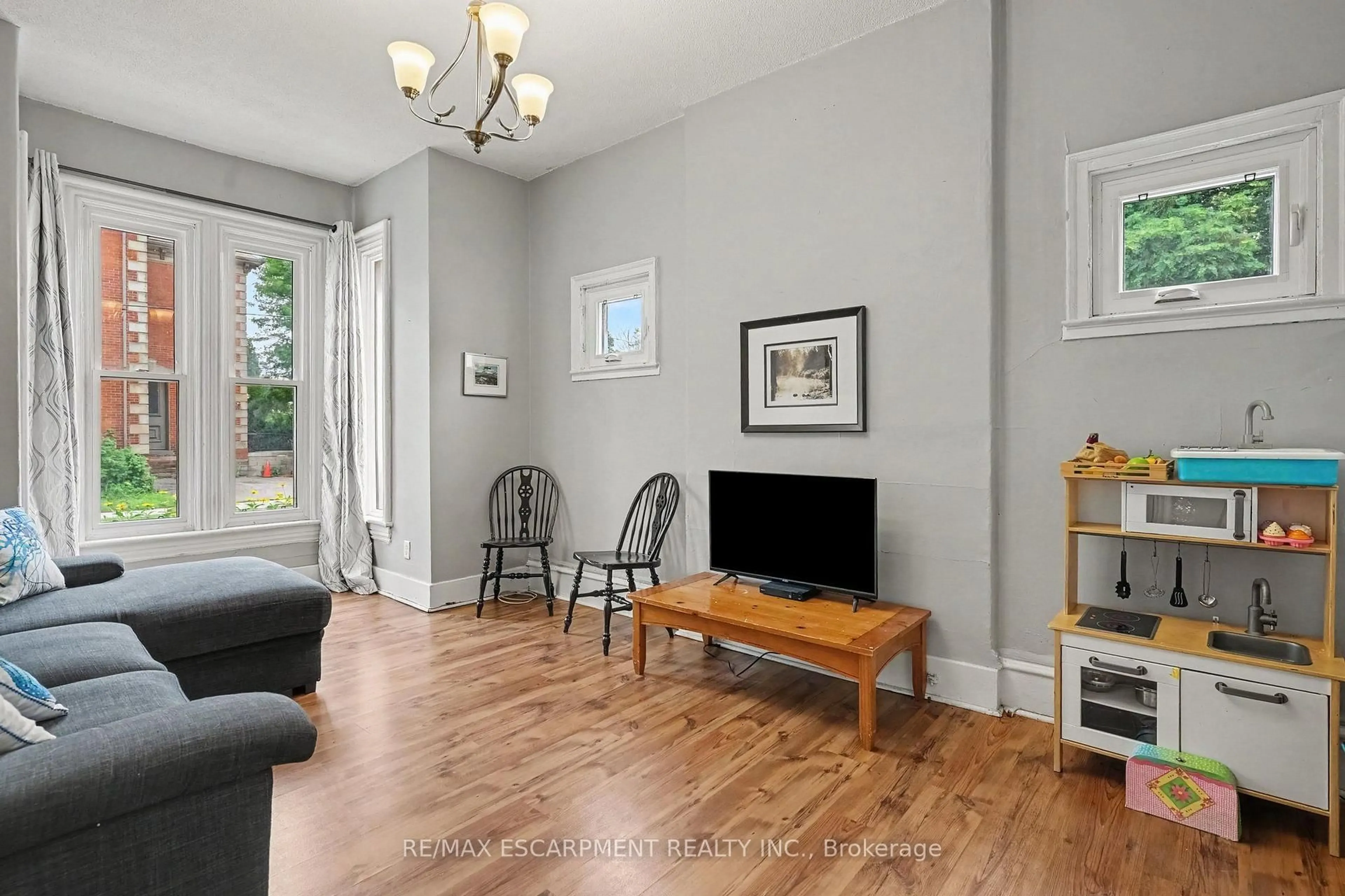 Living room with furniture, unknown for 22 Stinson St, Hamilton Ontario L8N 1R7