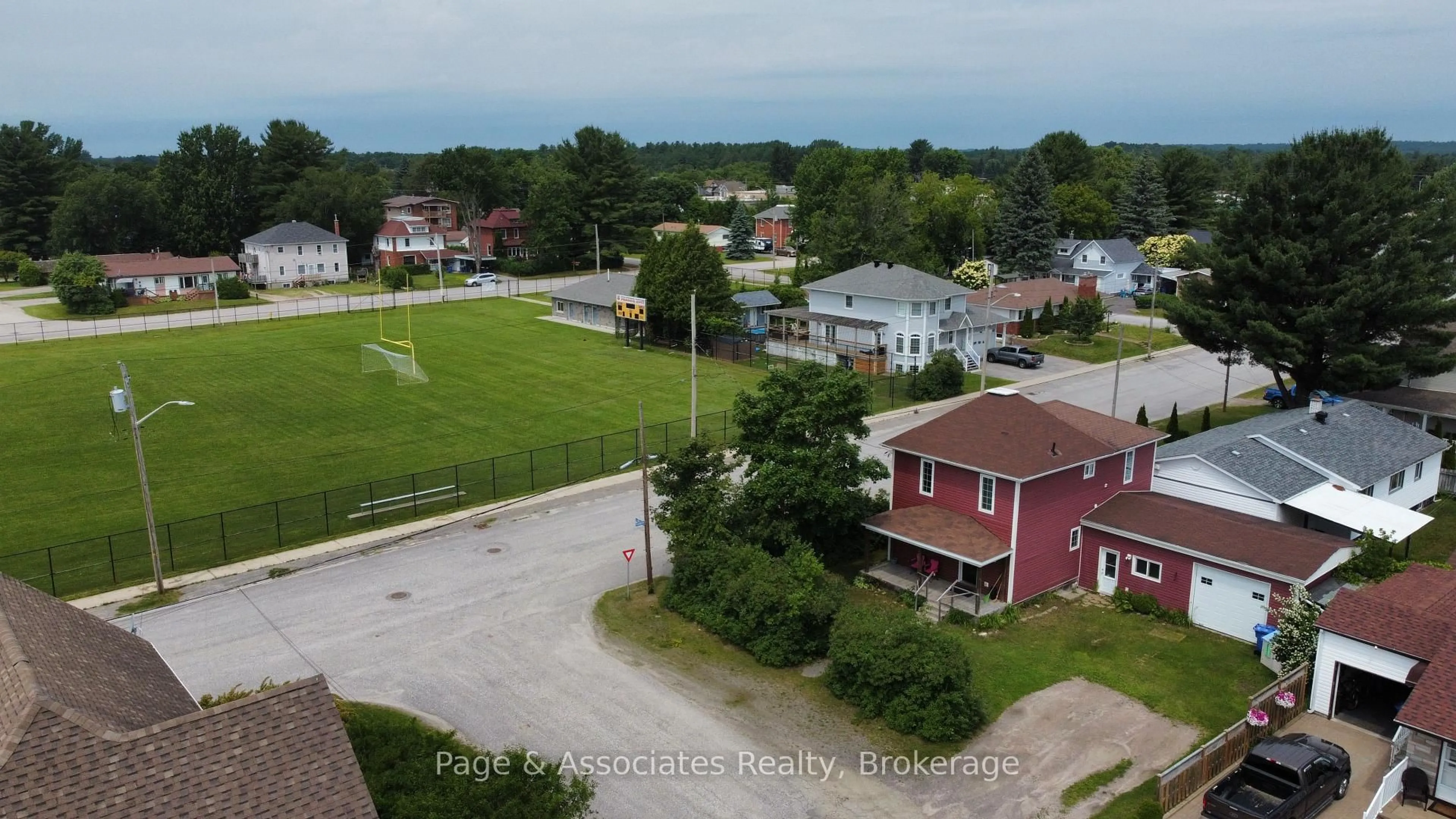 A pic from outside/outdoor area/front of a property/back of a property/a pic from drone, street for 99 Russell St, West Nipissing Ontario P2B 1X2