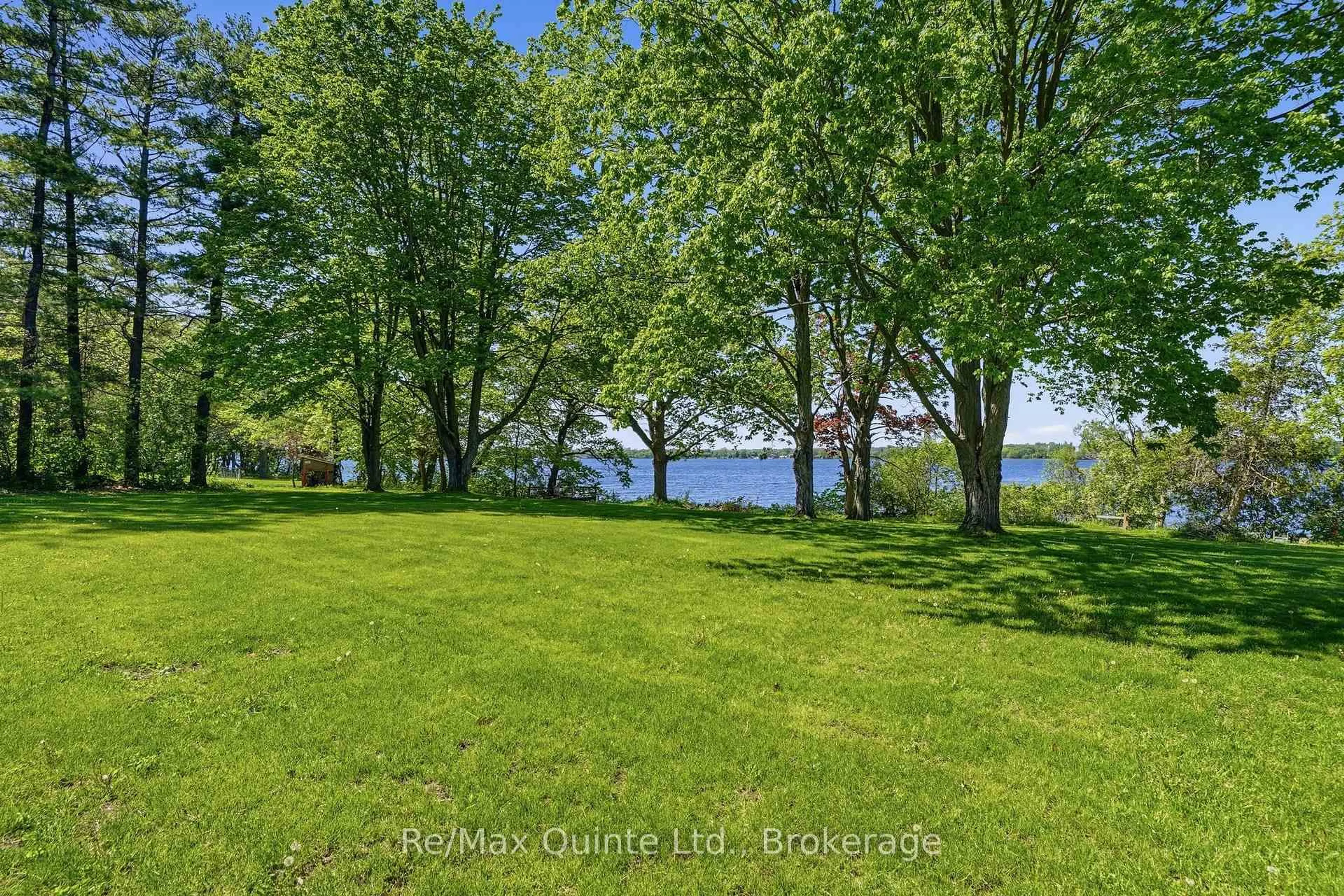 A pic from outside/outdoor area/front of a property/back of a property/a pic from drone, water/lake/river/ocean view for 1678 County Road 3, Prince Edward County Ontario K0K 1L0