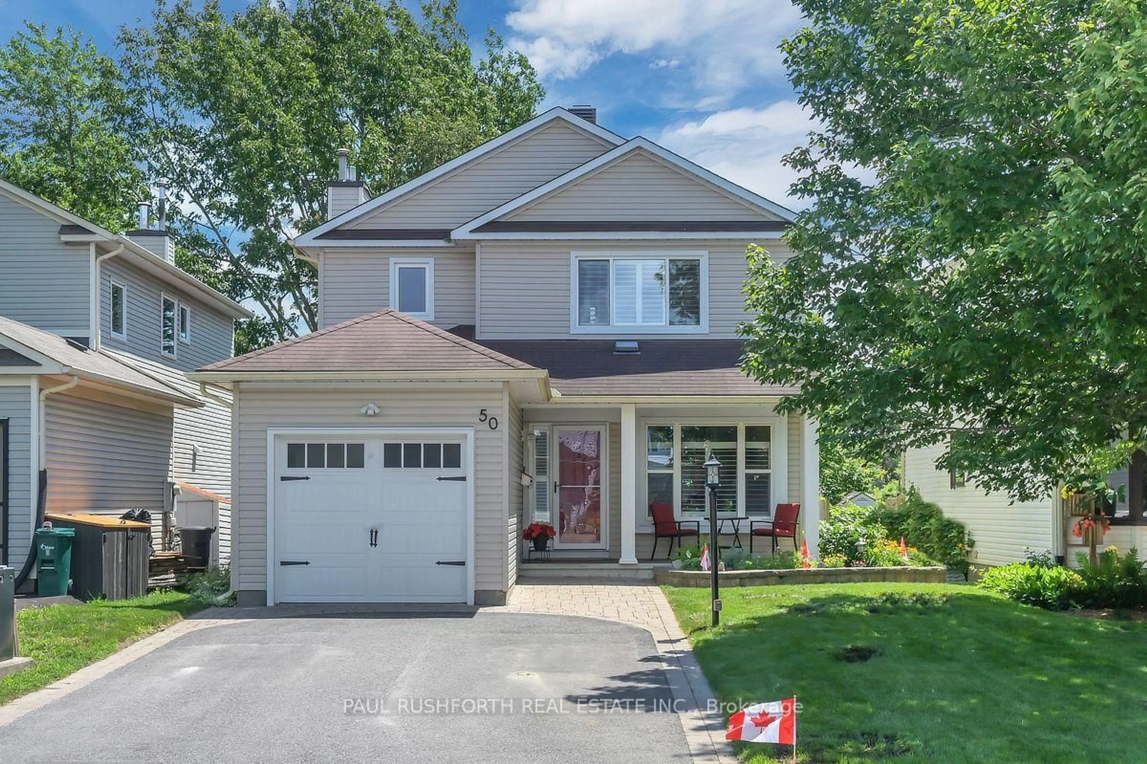 Home with vinyl exterior material, street for 50 Vesta St, Ottawa Ontario K2J 3Y9