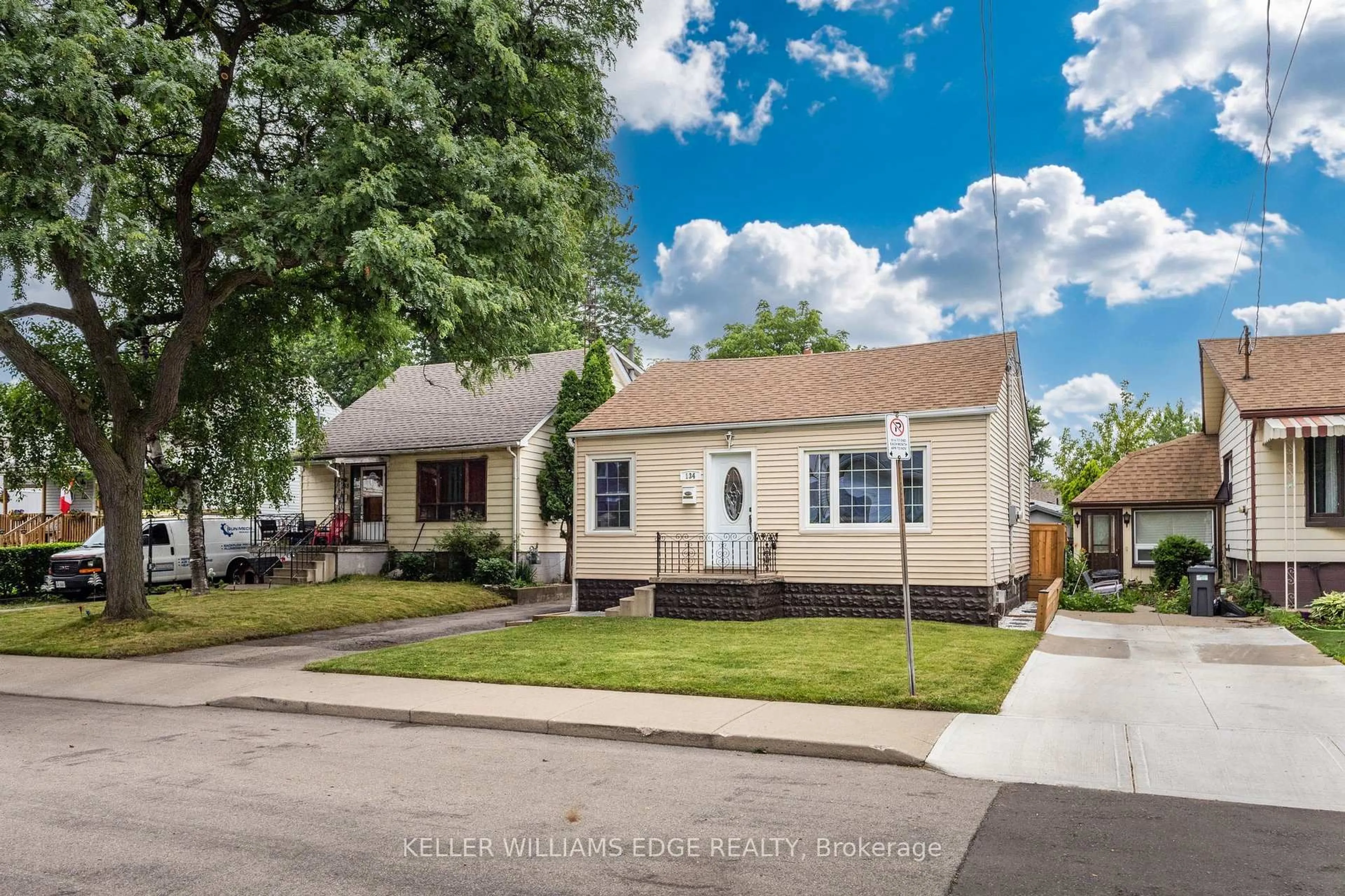 Home with vinyl exterior material, street for 134 Selkirk Ave, Hamilton Ontario L8H 5M2