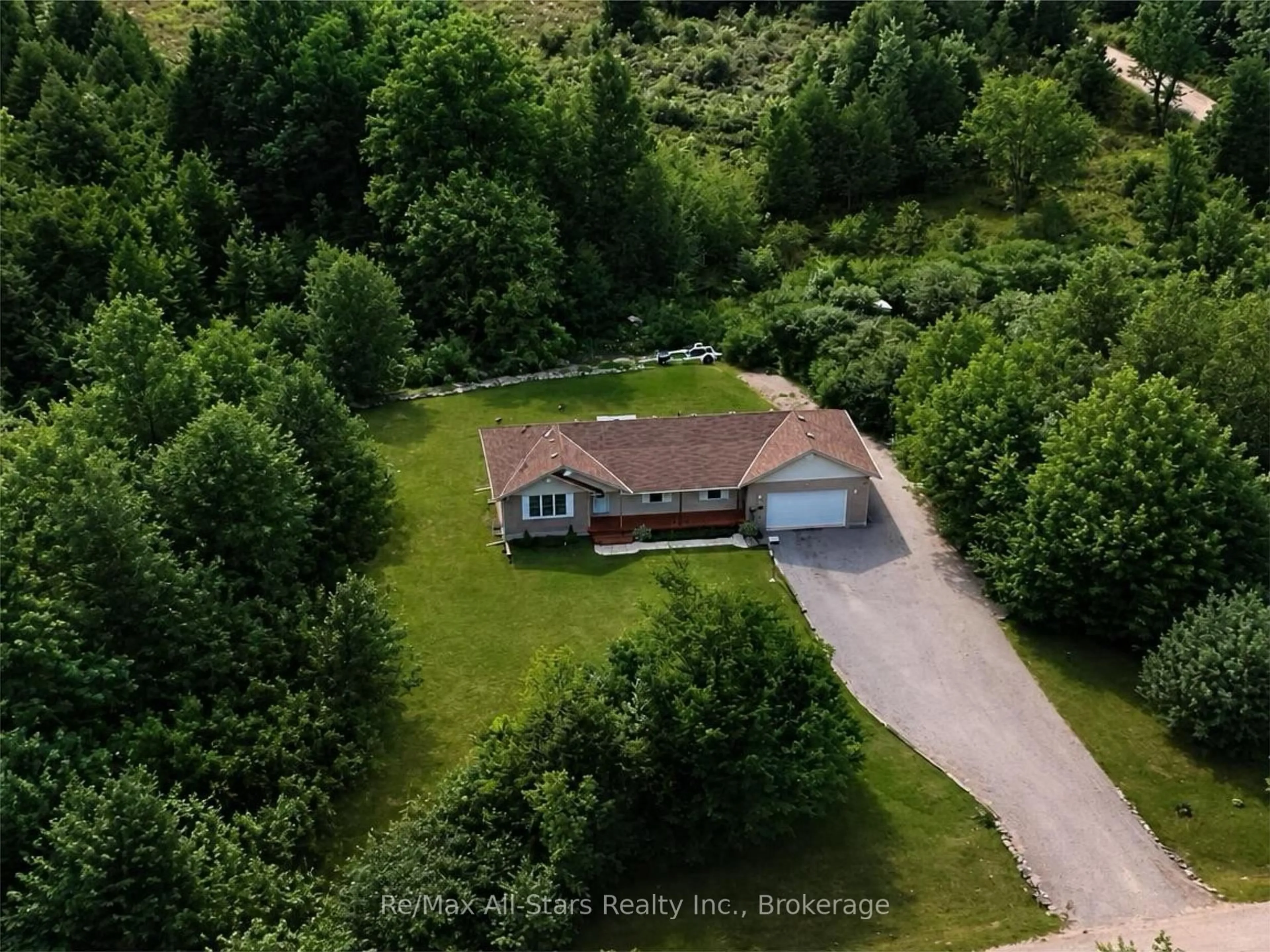 A pic from outside/outdoor area/front of a property/back of a property/a pic from drone, unknown for 95 Moonline Rd, Trent Lakes Ontario K0M 1A0