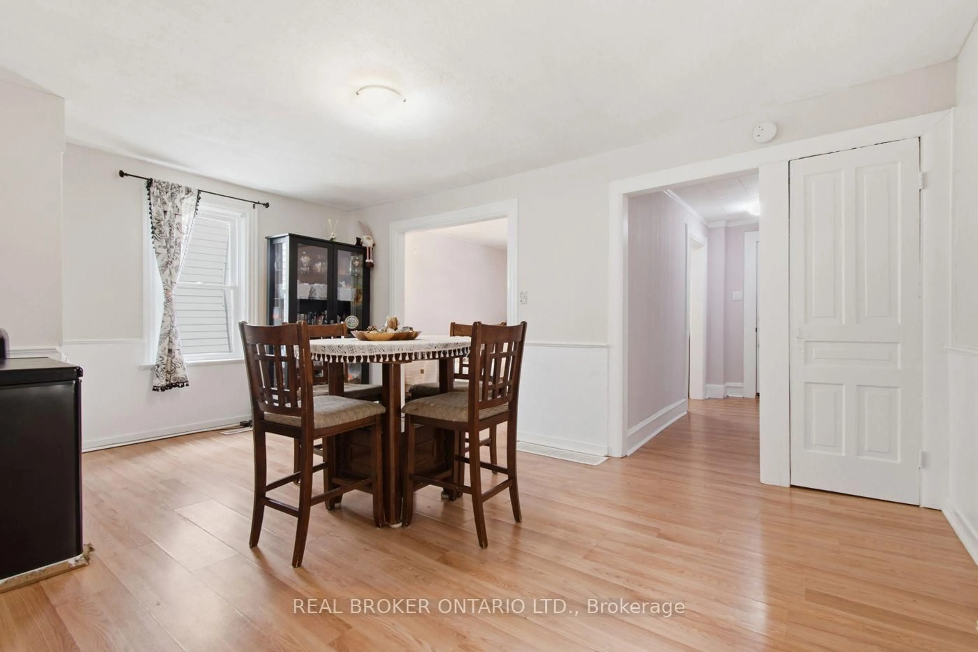Dining room, wood/laminate floor for 12 Elmview St, Welland Ontario L3C 4K5