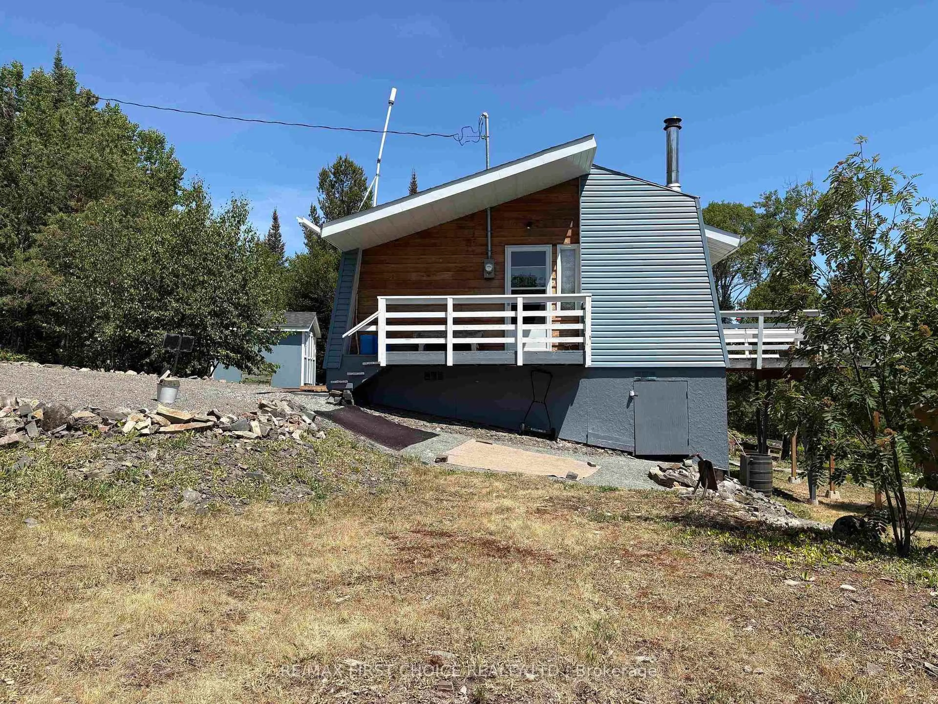 A pic from outside/outdoor area/front of a property/back of a property/a pic from drone, unknown for 560 Little Trout Bay Rd., Neebing Ontario P7L 0A4