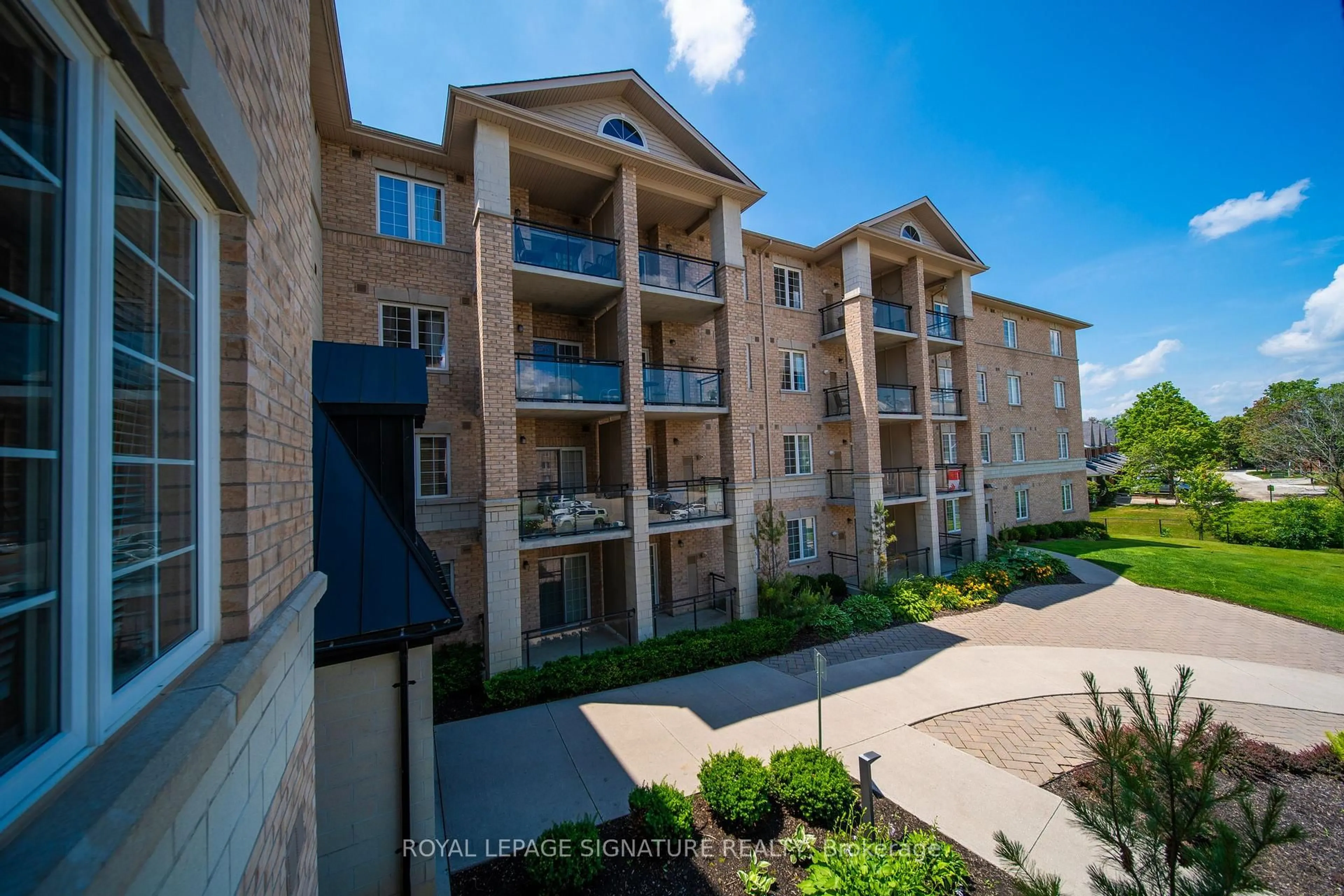 A pic from outside/outdoor area/front of a property/back of a property/a pic from drone, unknown for 1077 Gordon St #228, Guelph Ontario N1G 0E3