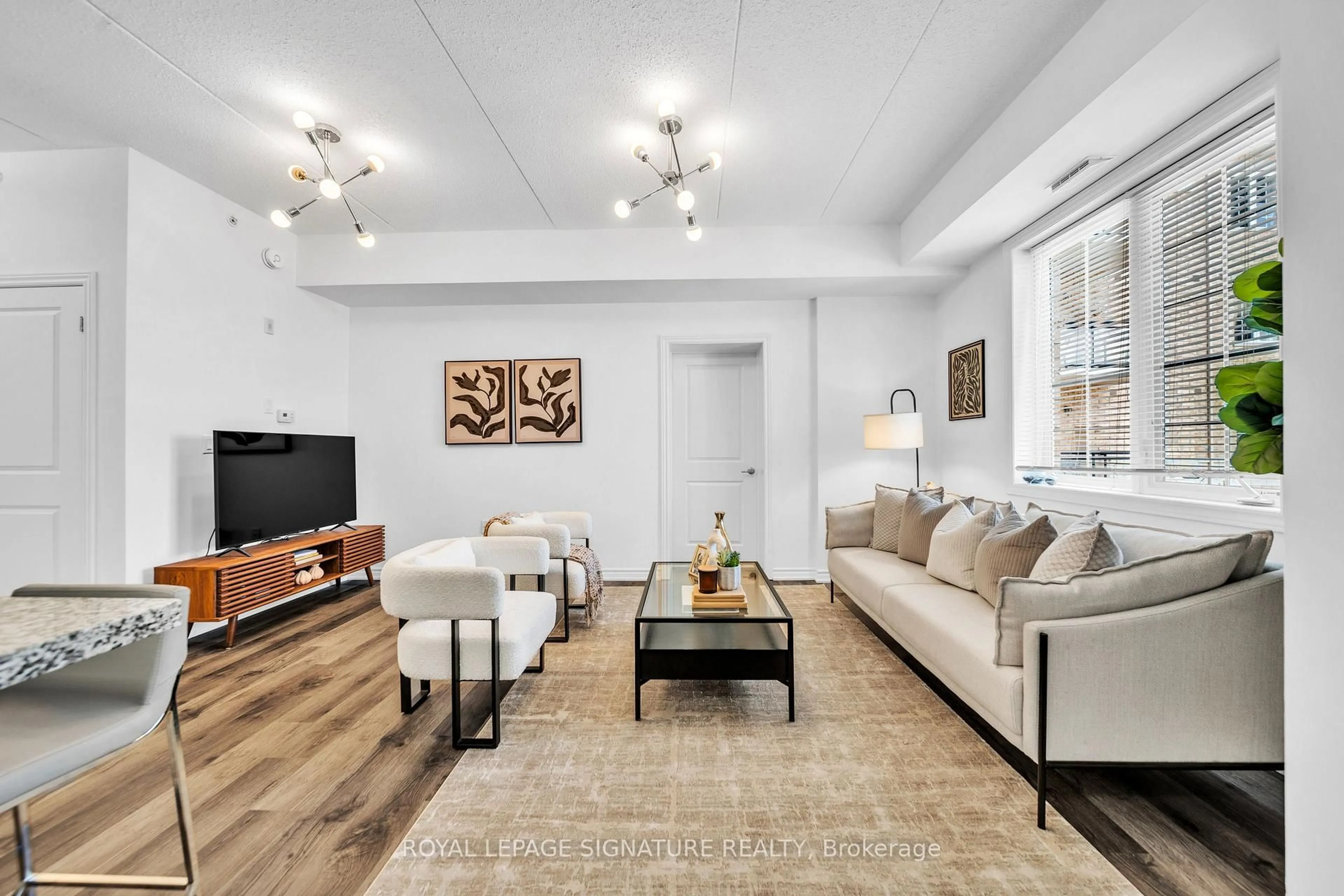 Living room with furniture, unknown for 1077 Gordon St #228, Guelph Ontario N1G 0E3