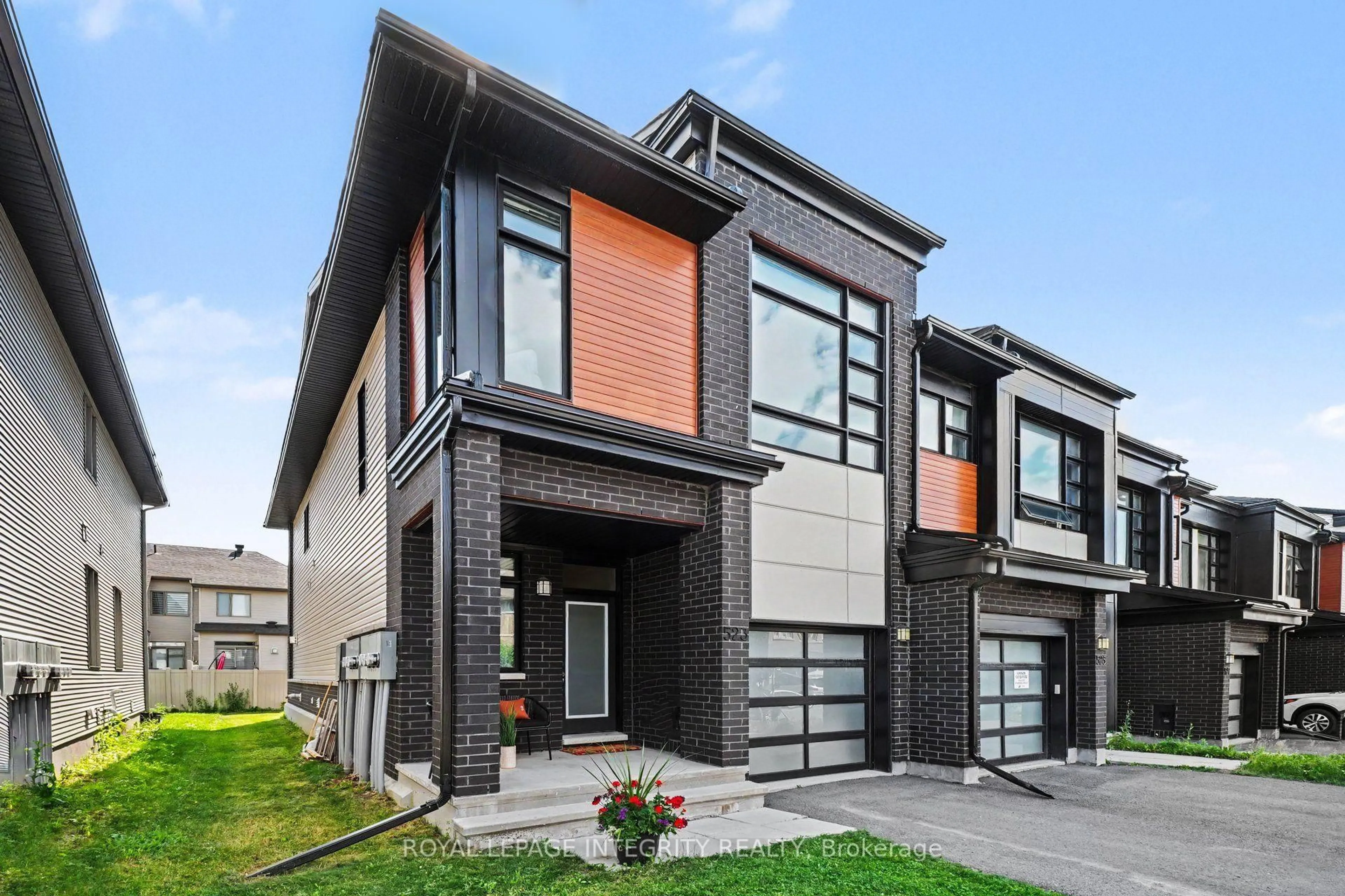 Home with brick exterior material, street for 523 Triangle St, Ottawa Ontario K2V 0M7
