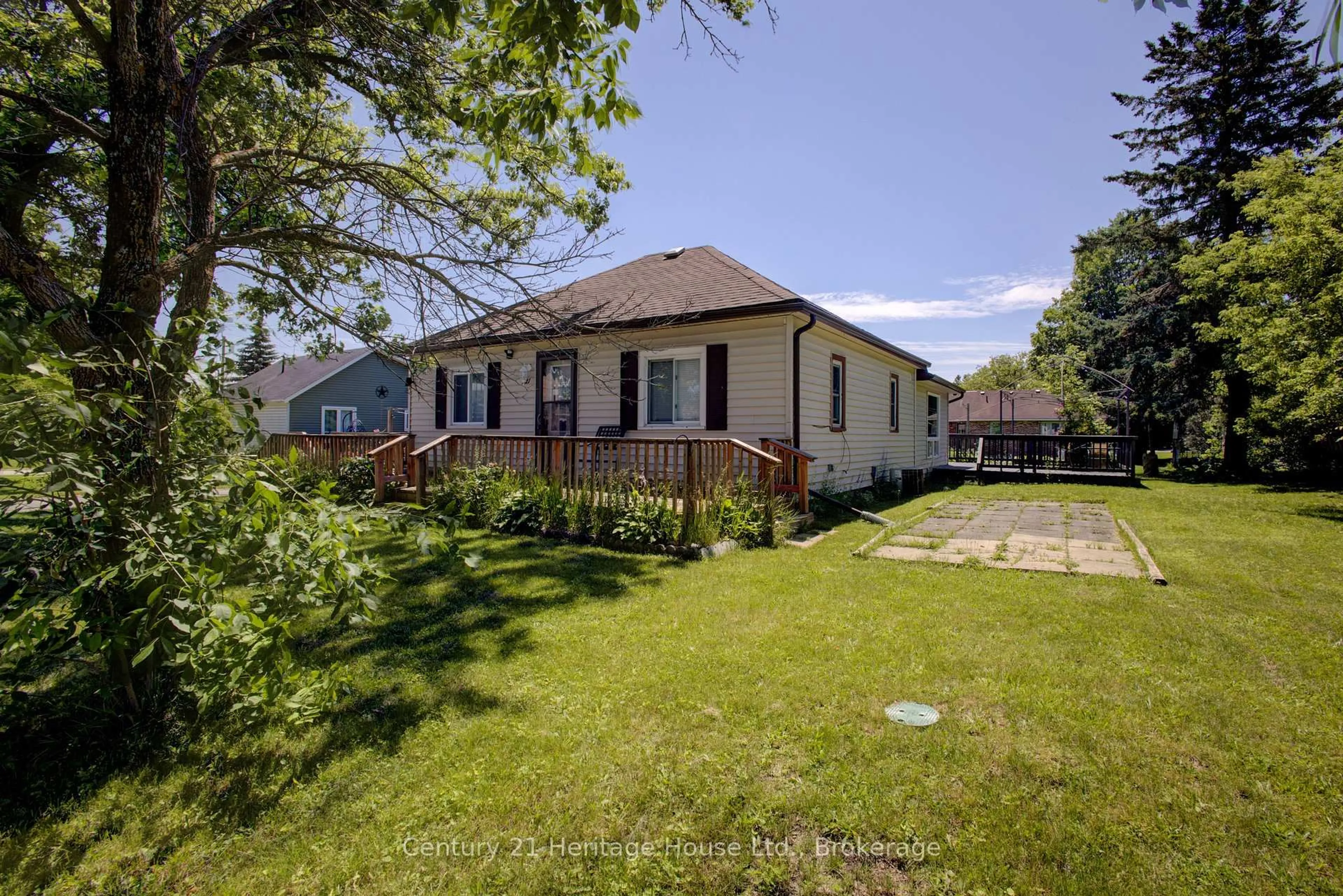 A pic from outside/outdoor area/front of a property/back of a property/a pic from drone, unknown for 221 Park St, West Grey Ontario N0G 1R0