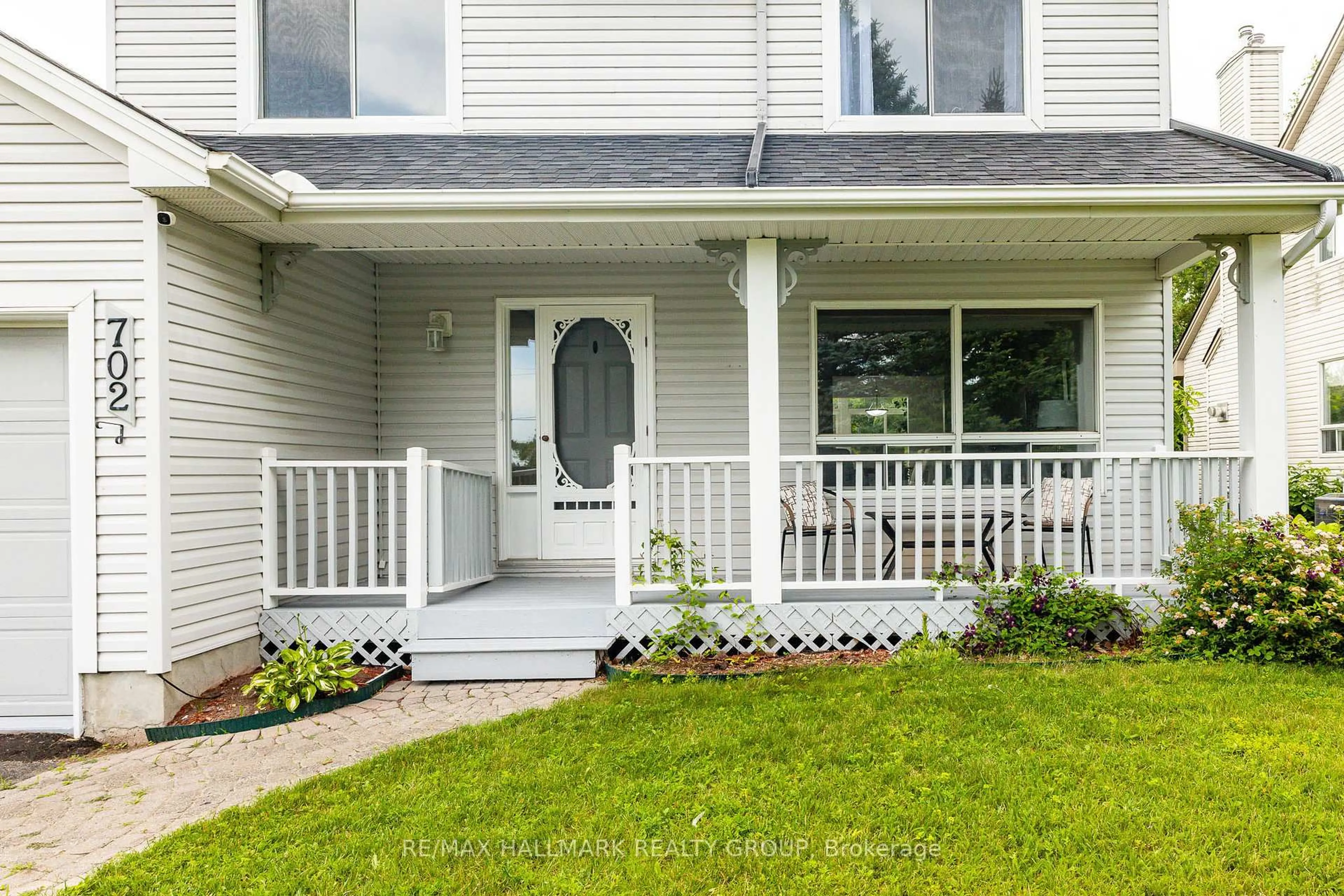 Home with vinyl exterior material, street for 702 Maley St, North Grenville Ontario K0G 1J0