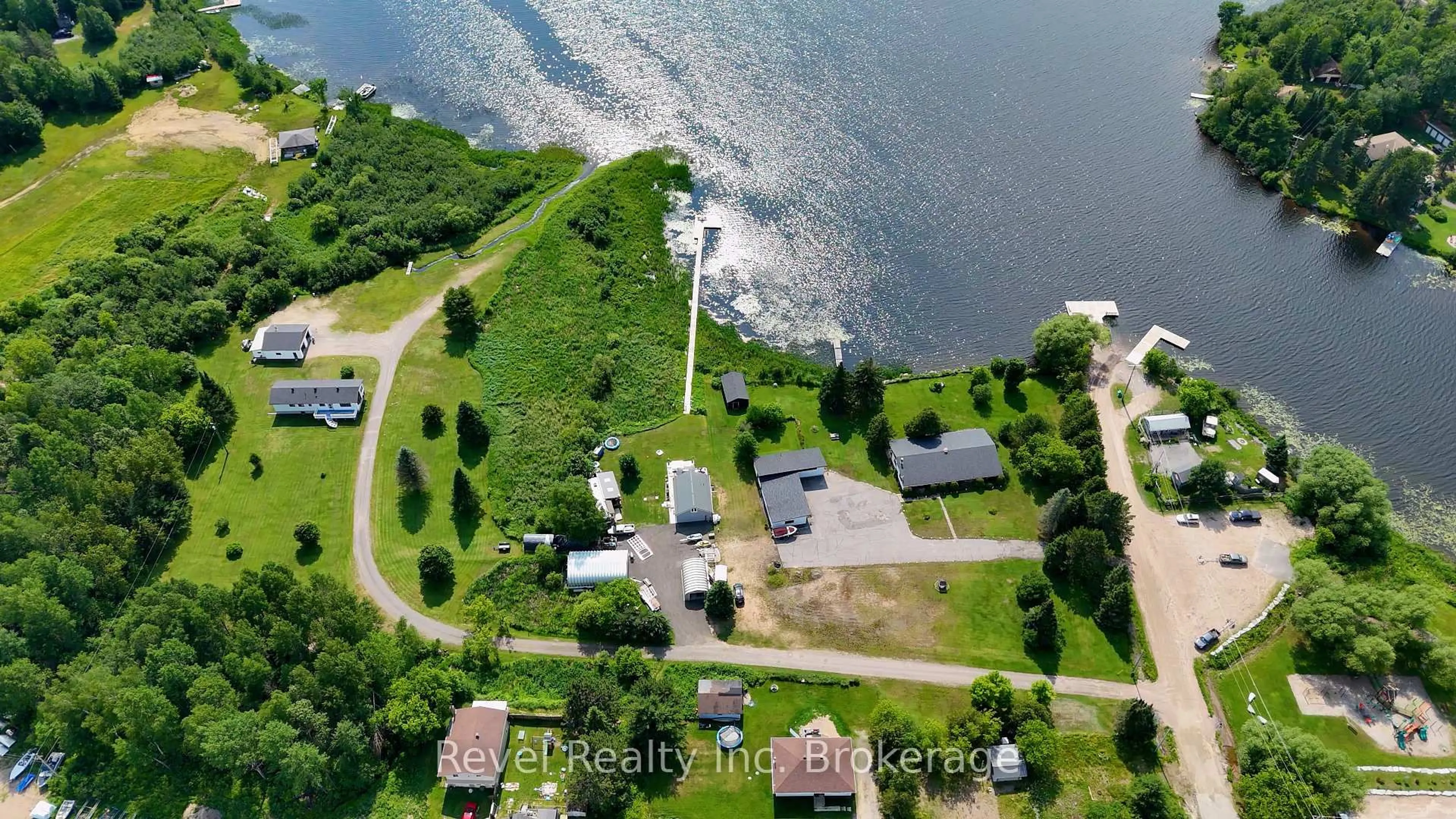 A pic from outside/outdoor area/front of a property/back of a property/a pic from drone, water/lake/river/ocean view for 102 Church St, Bonfield Ontario P0H 1E0