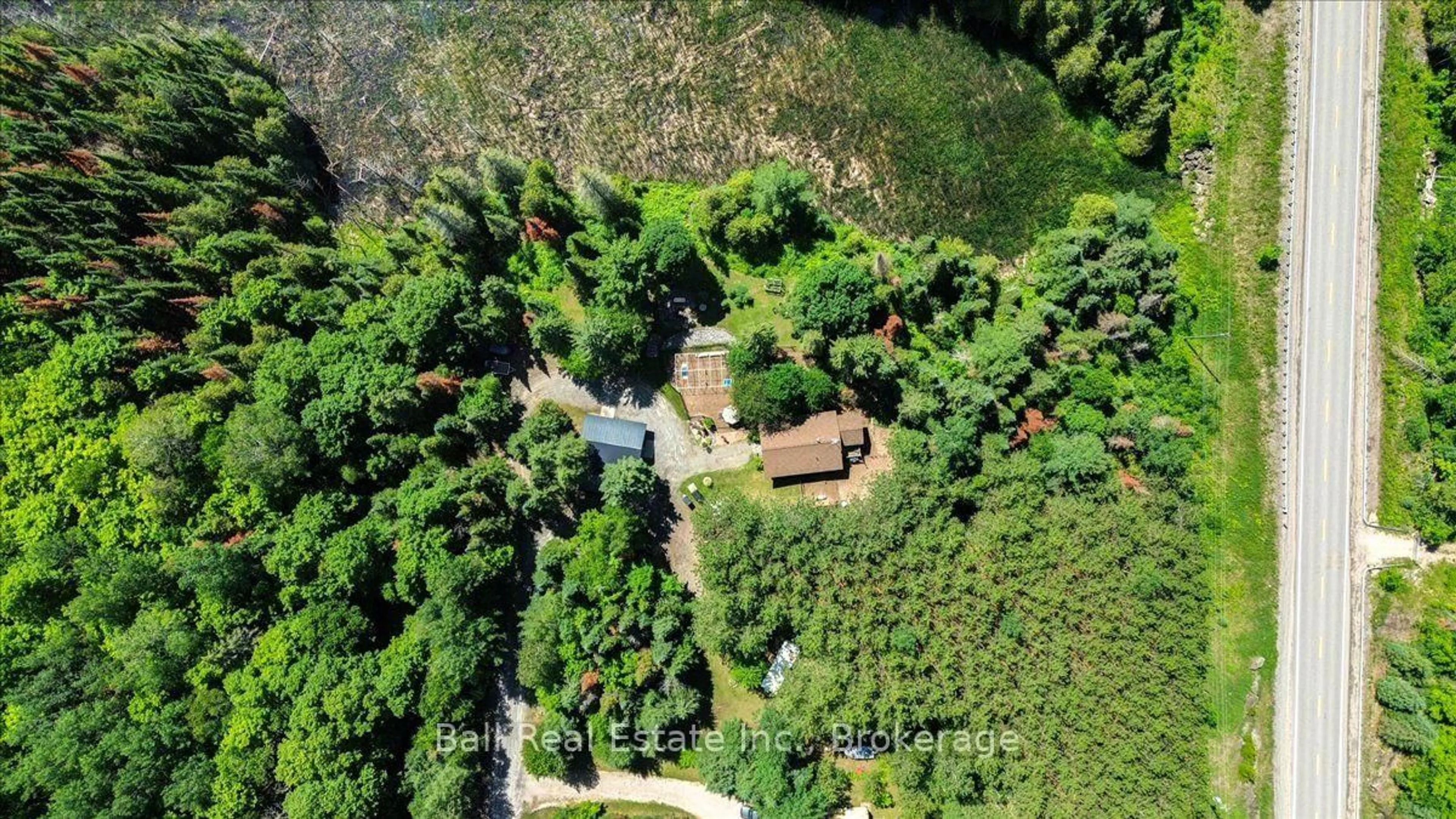 A pic from outside/outdoor area/front of a property/back of a property/a pic from drone, forest/trees view for 25350F Hwy 62 South, Bancroft Ontario K0L 2L0