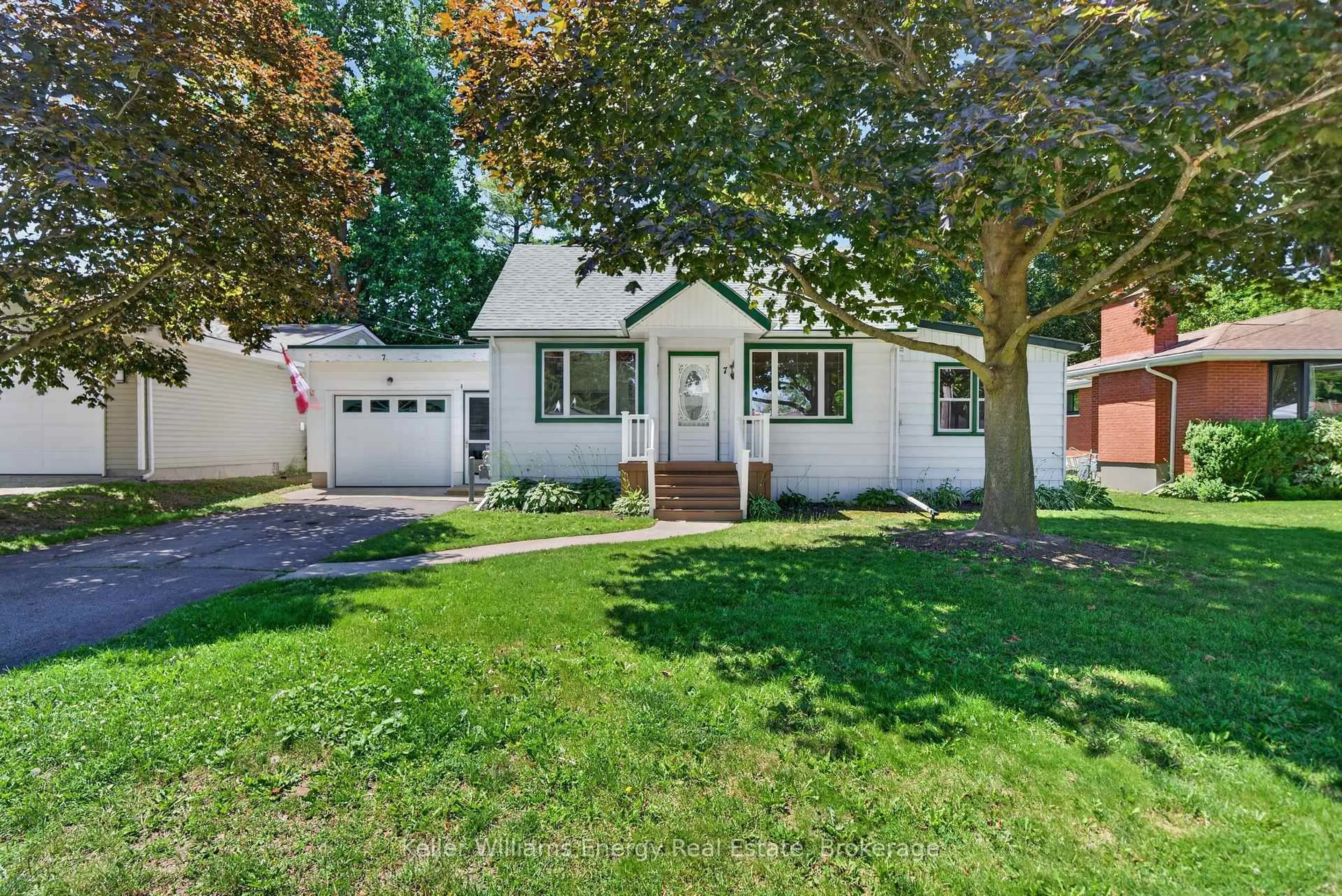 Home with vinyl exterior material, street for 7 Maple Ave, Prince Edward County Ontario K0K 2T0